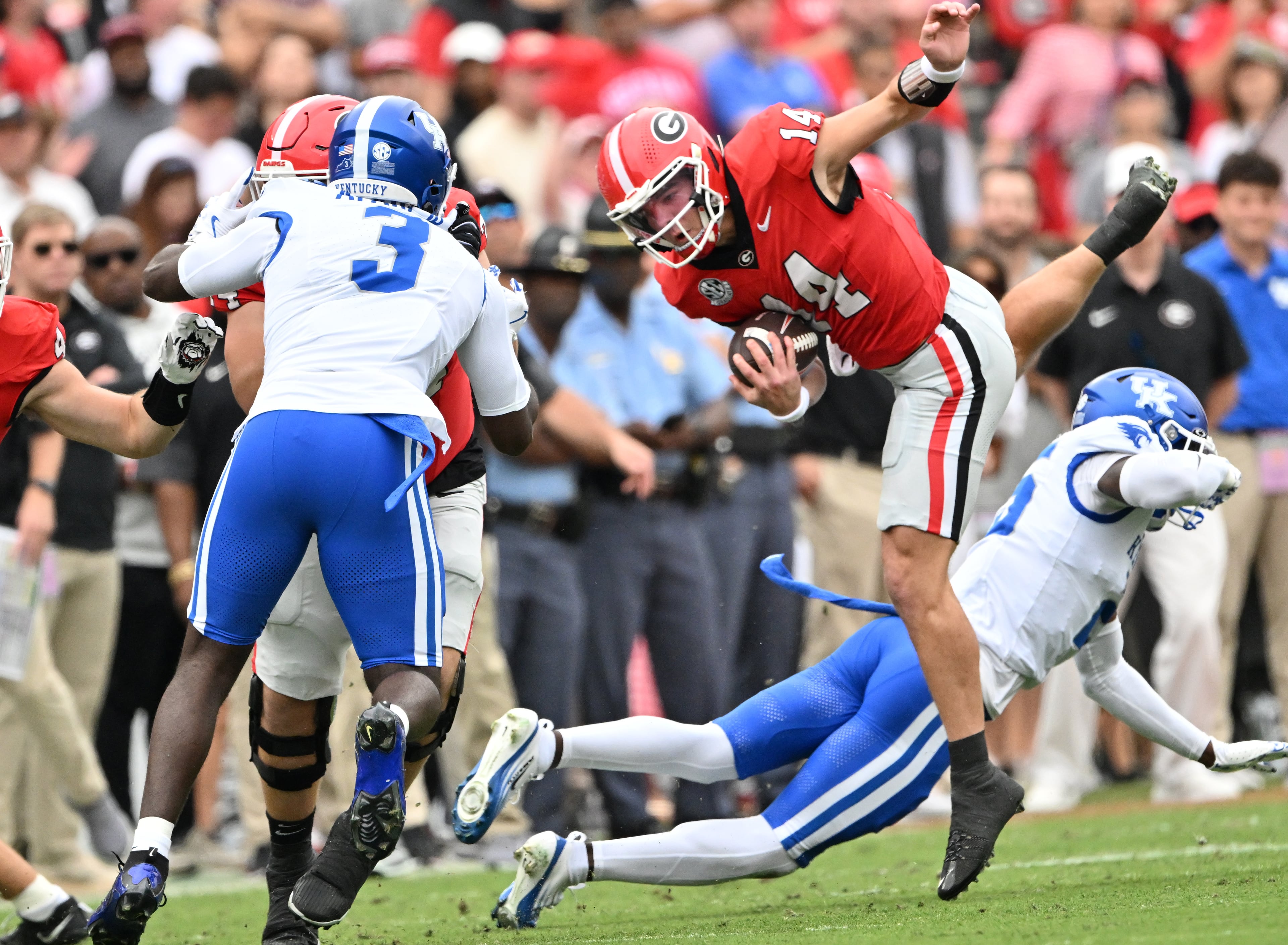 Georgia quarterback Gunner Stockton (14) runs the ball during the first half in a NCAA college football game at Sanford Stadium, Saturday, October 4, 2025, in Athens. (Hyosub Shin / AJC)