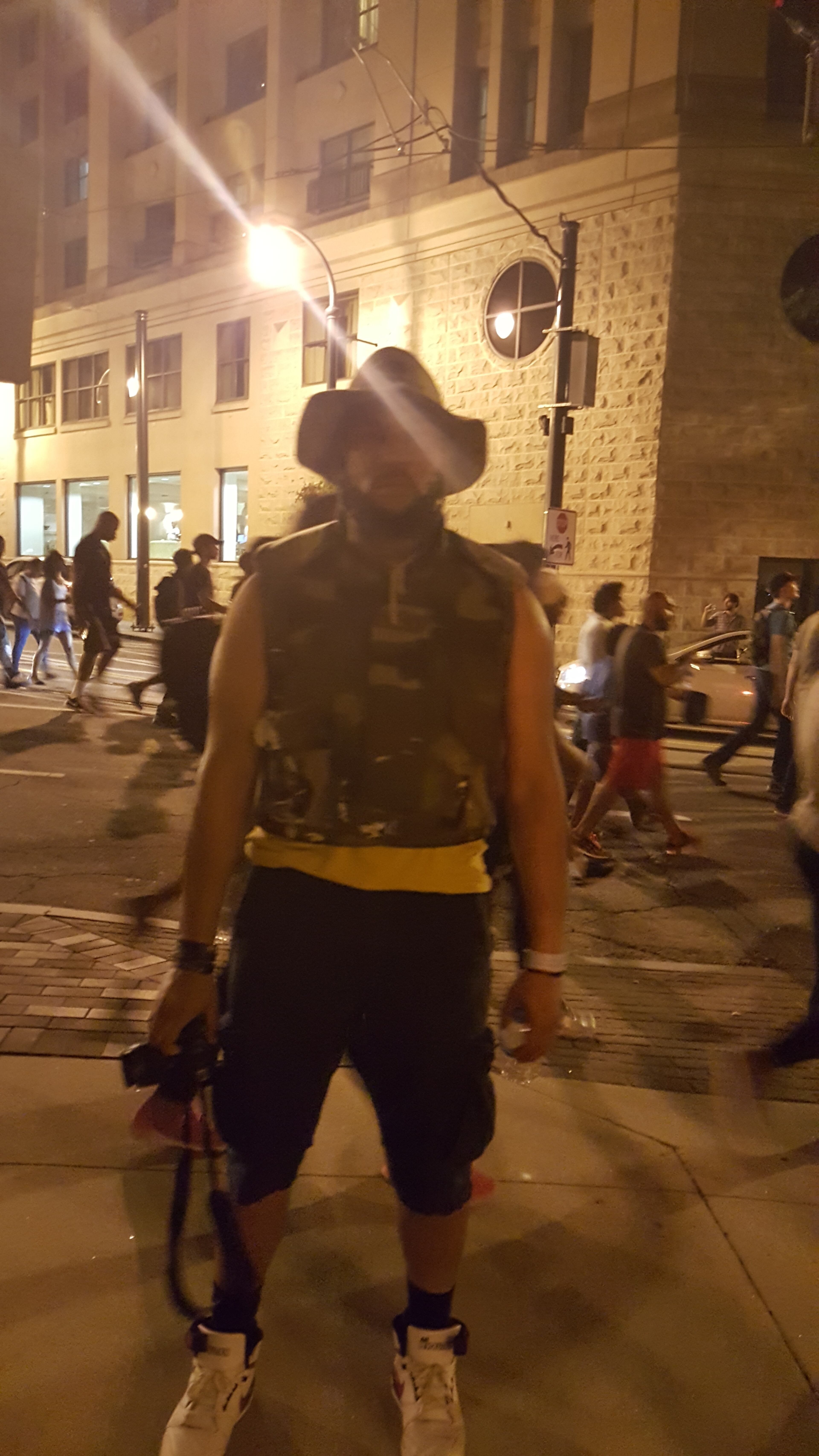 Jamie Lake, 30, owner of American sushi recording studio in little five. He said he's marching for his 9-year-old daughter. "She asked me not to get shot so I wore this bullet proof vest." He said he hopes keeping protest alive late into the night will show people they're "not protesting for no reason."