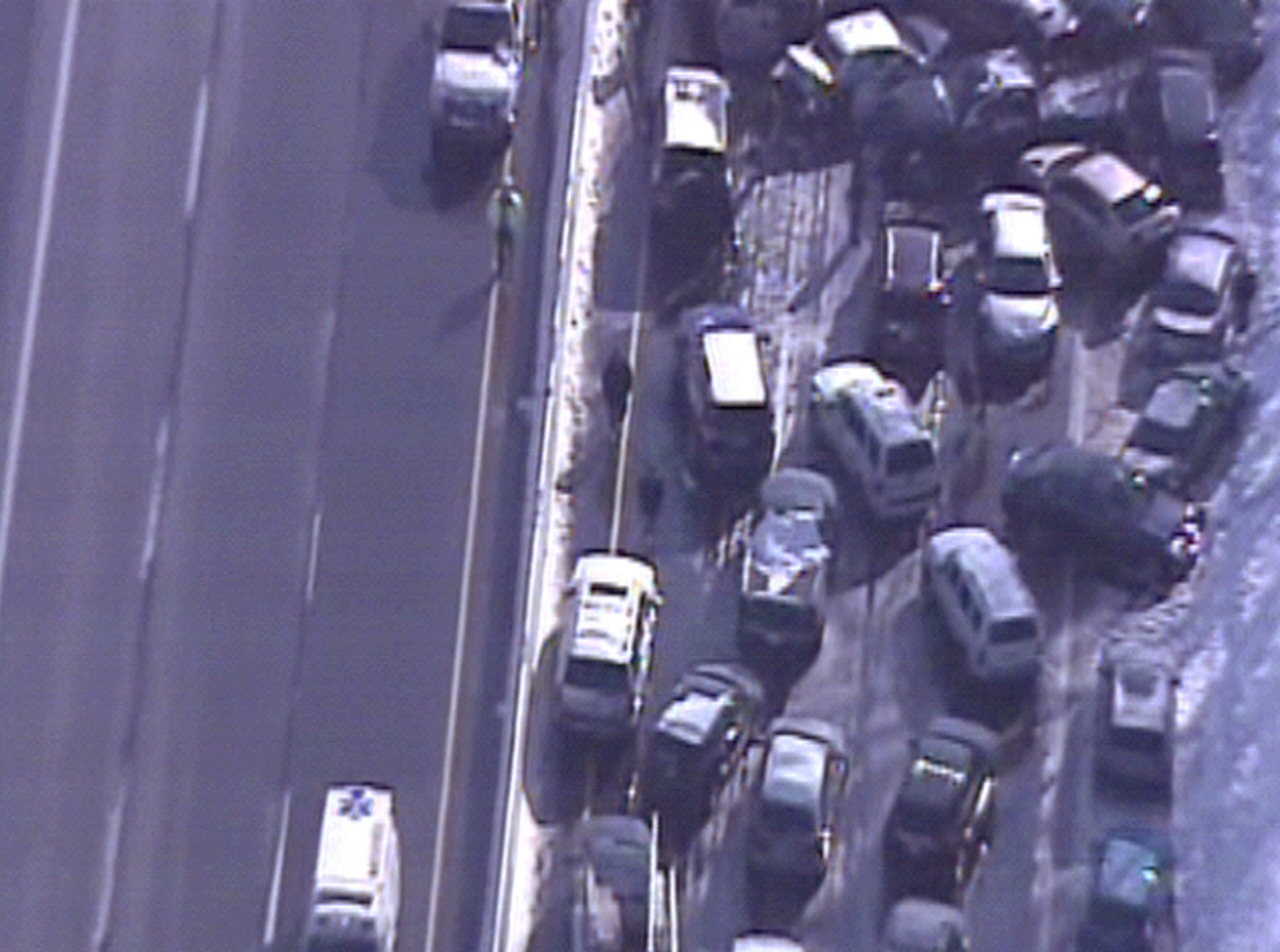 This video frame grab provided by Fox 29 Philadelphia shows traffic accidents involving multiple tractor trailers and dozens of cars on Pennsylvania Turnpike outside Philadelphia, on Friday, Feb. 14, 2014. The crashes were reported just after 8 a.m. Friday, one day after the area got about a foot of snow that left roads slick. Television news helicopter footage showed several tractor-trailers and dozens of cars involved in a series of accidents that had backed up traffic for miles between the Bensalem and Willow Grove exits. (AP Photo/Fox 29 Philadelphia)