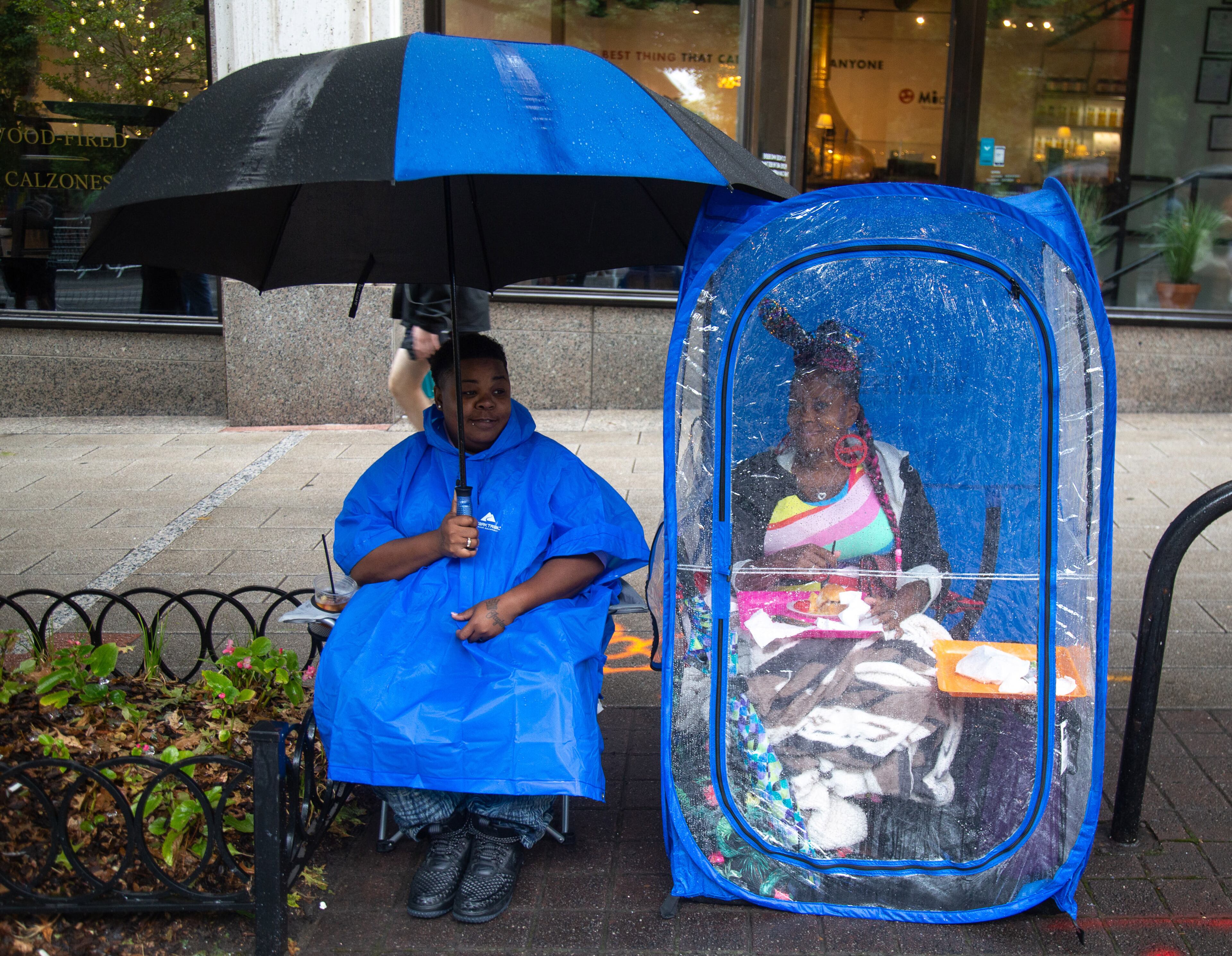 Shana Tace (L) And Nipassion Vilsginy get ready for the start of the 49th annual Pride Festival and Parade in Atlanta on Sunday, Oct. 13, 2019. STEVE SCHAEFER / SPECIAL TO THE AJC