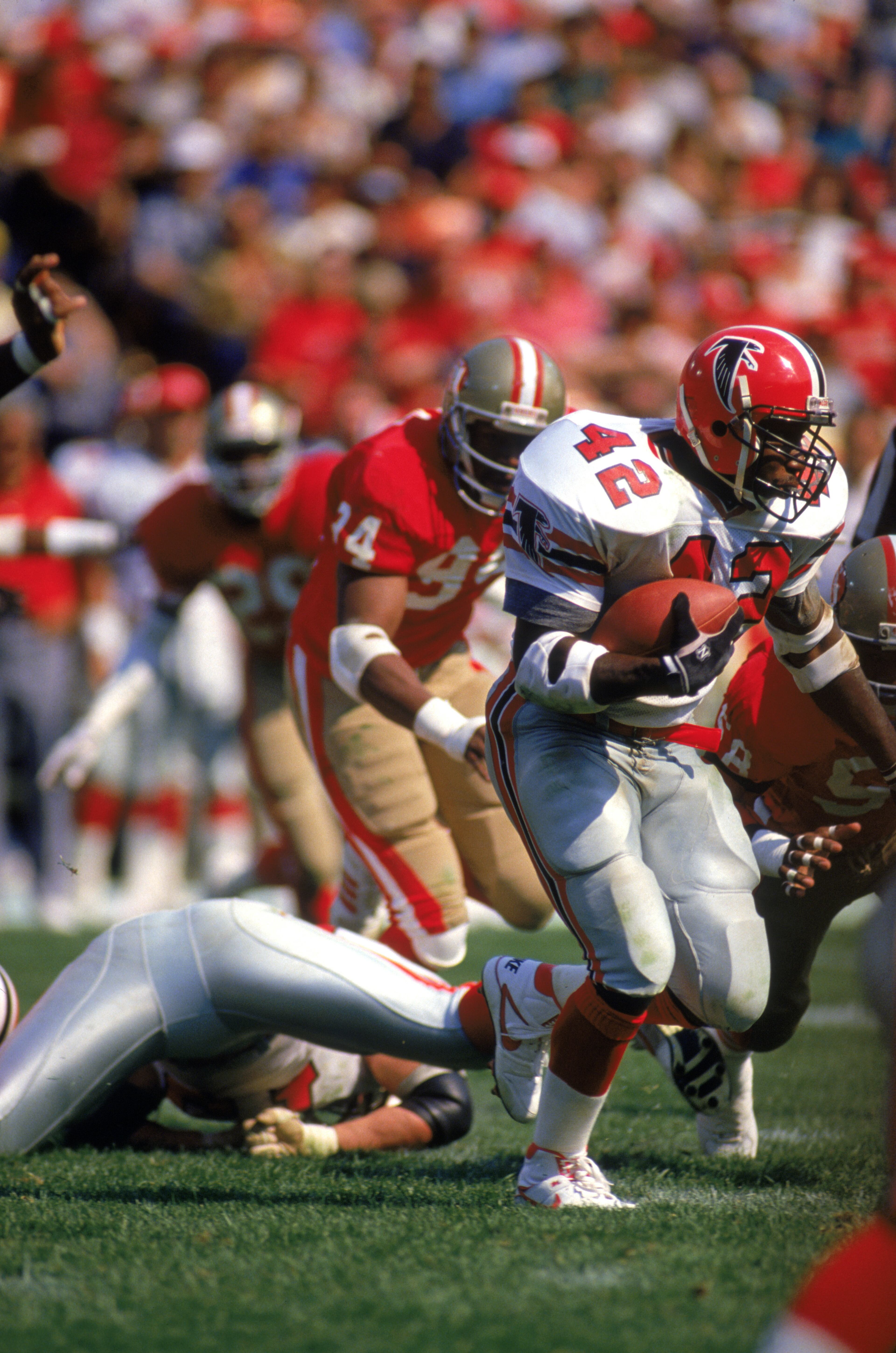 Running back Gerald Riggs of the Falcons rushes against the 49ers at Candlestick Park in 1988. The Falcons pulled off a rare victory against the 49ers of '80s, winning 34-17. (Photo by George Rose/Getty Images)
