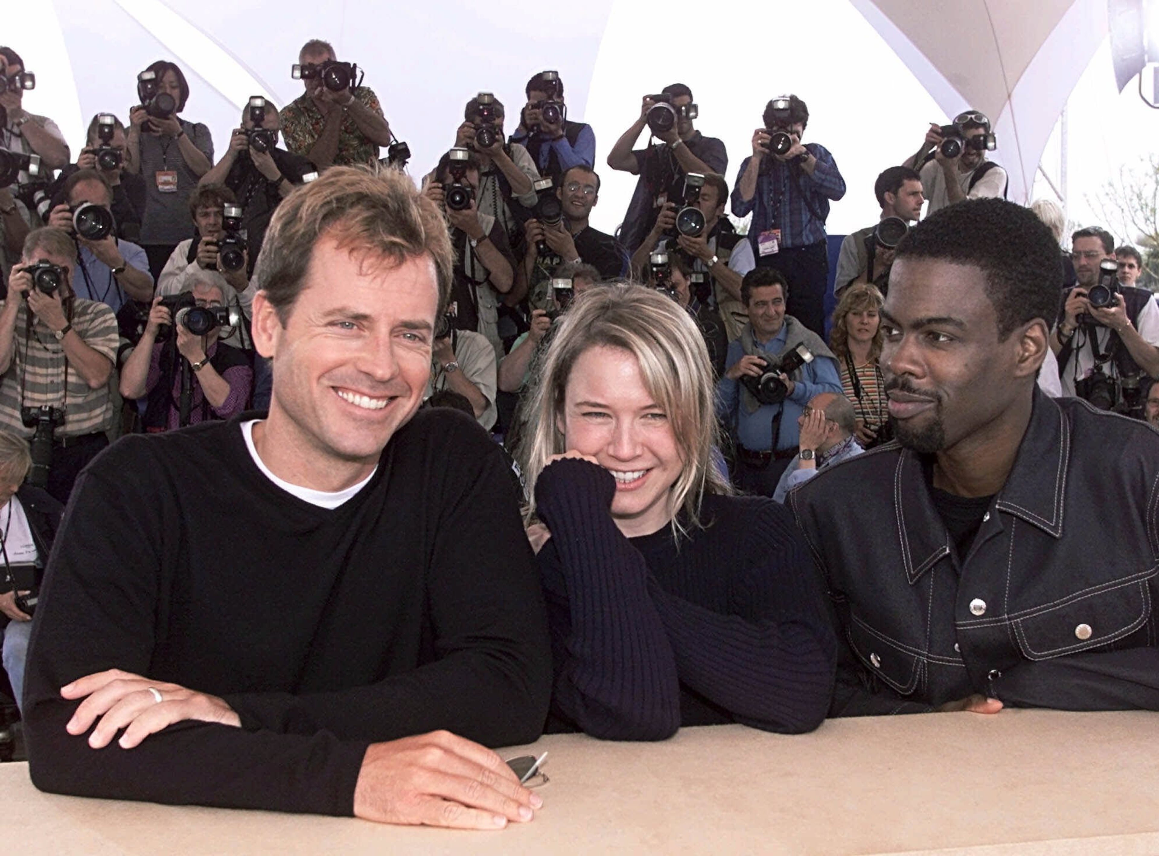 American actors Greg Kinnear, left, Renee Zellweger, center, and Chris Rock, pose during a photocall, at the Film Festival of Cannes, for their film "Nurse Betty," in competition for the Golden Palm, in Cannes, France, Friday May 12, 2000. (AP Photo/Lionel Cironneau)