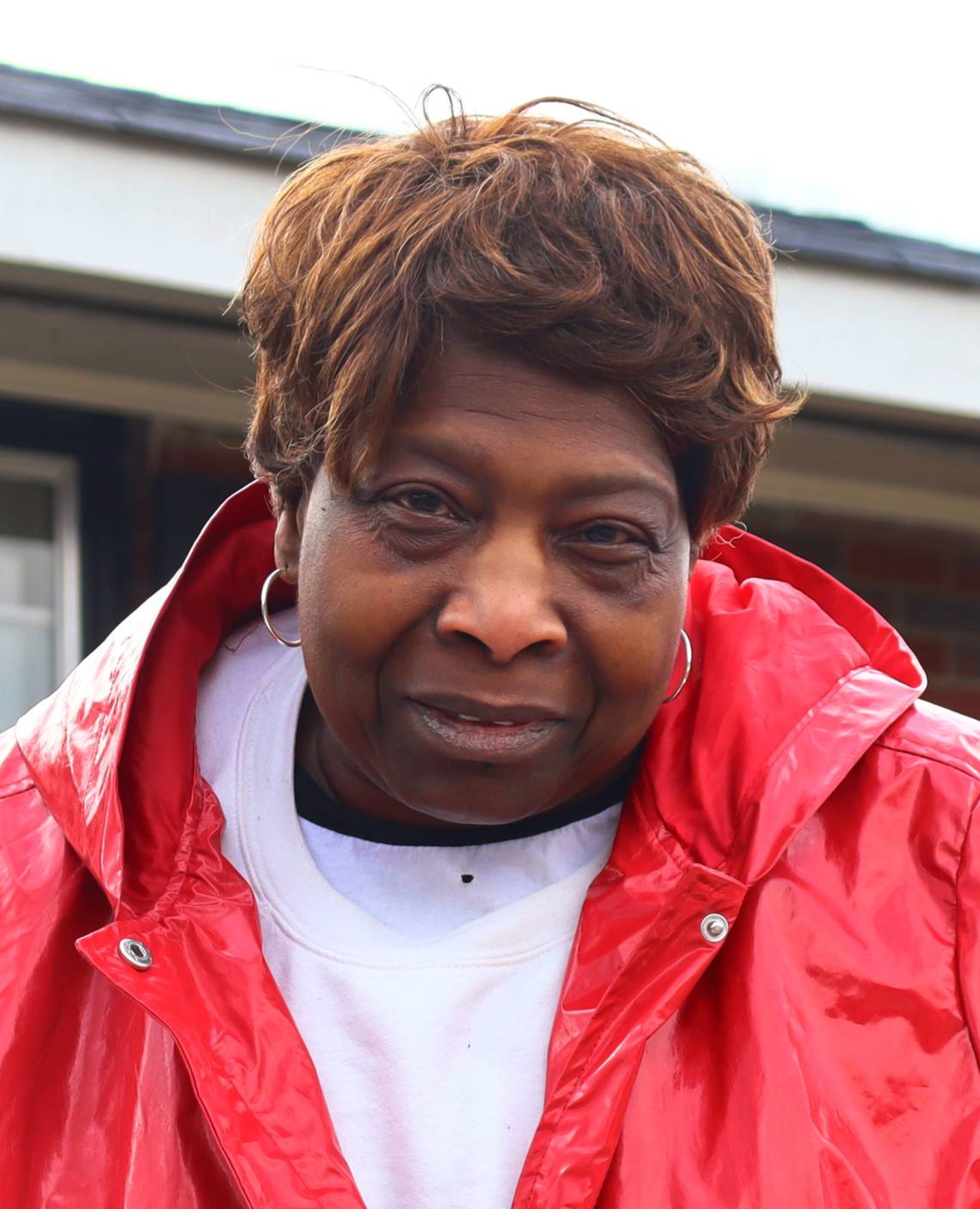 Vivian Nelson,70, stands in front of her house in Columbus, Georgia. Nelson’s broken A/C and heater were fixed for free through the weatherization program in early January. (Photo Courtesy of Kala Hunter)