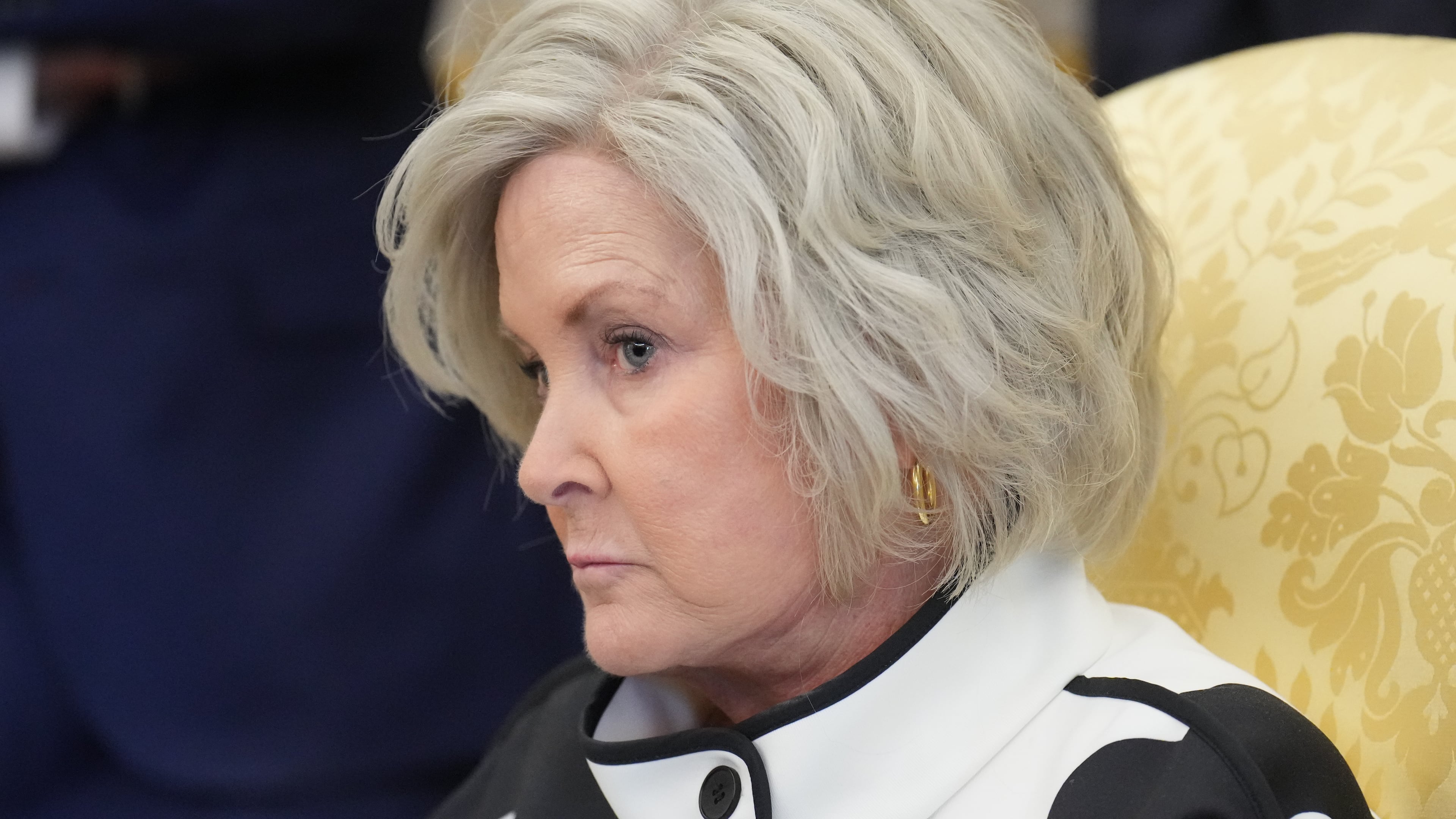 White House Chief of Staff Susie Wiles listens as President Donald Trump speaks and announces action to help farmers and ranchers, Friday, Sept. 4, 2026, in the Oval Office of the White House, in Washington. (AP Photo/Jacquelyn Martin)