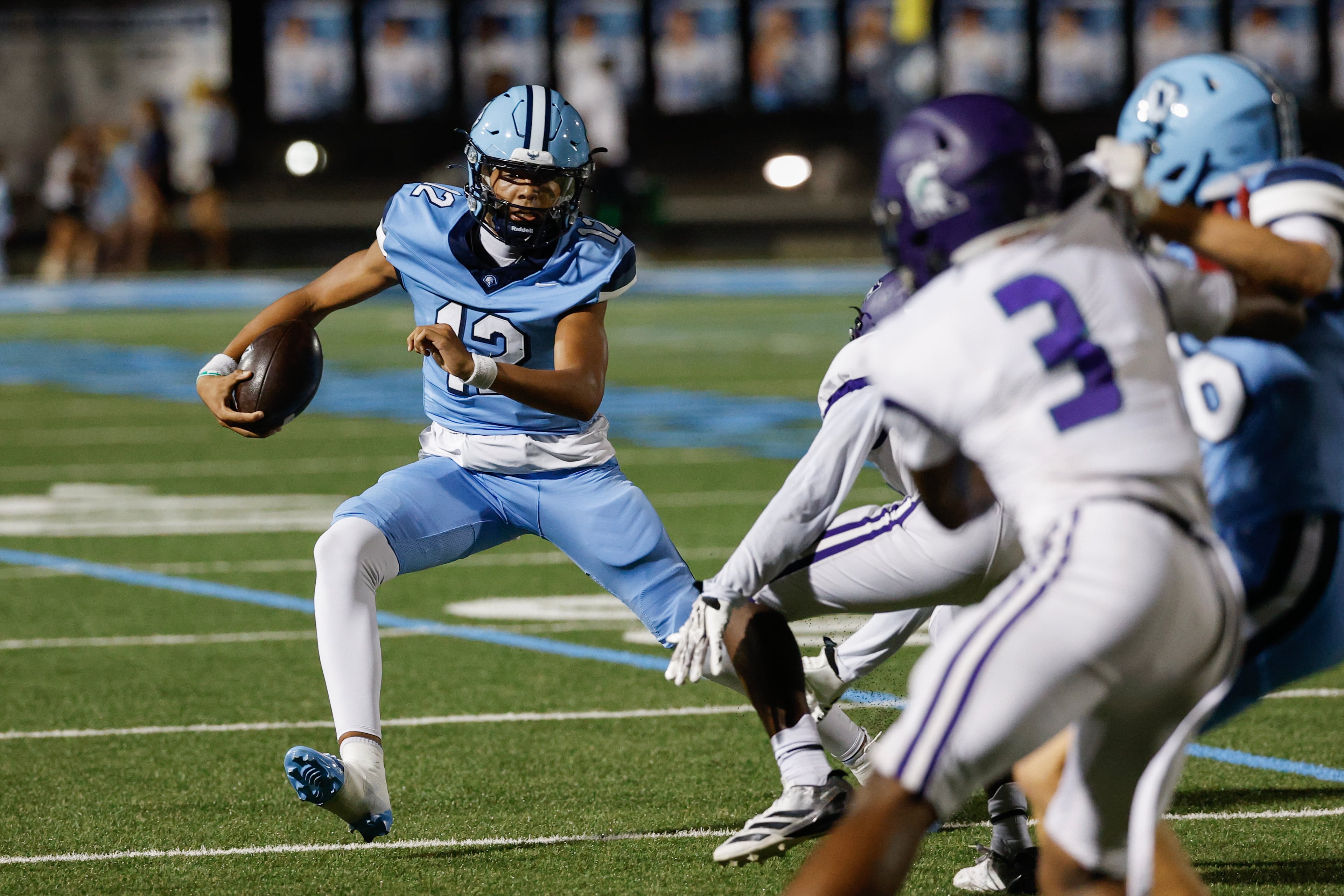 North Cobb Christian’s Jayden McCullough (left) scrambles against KIPP Atlanta during their game on Friday, Oct. 2, 2026, in Kennesaw. (Erik S. Lesser for the AJC)