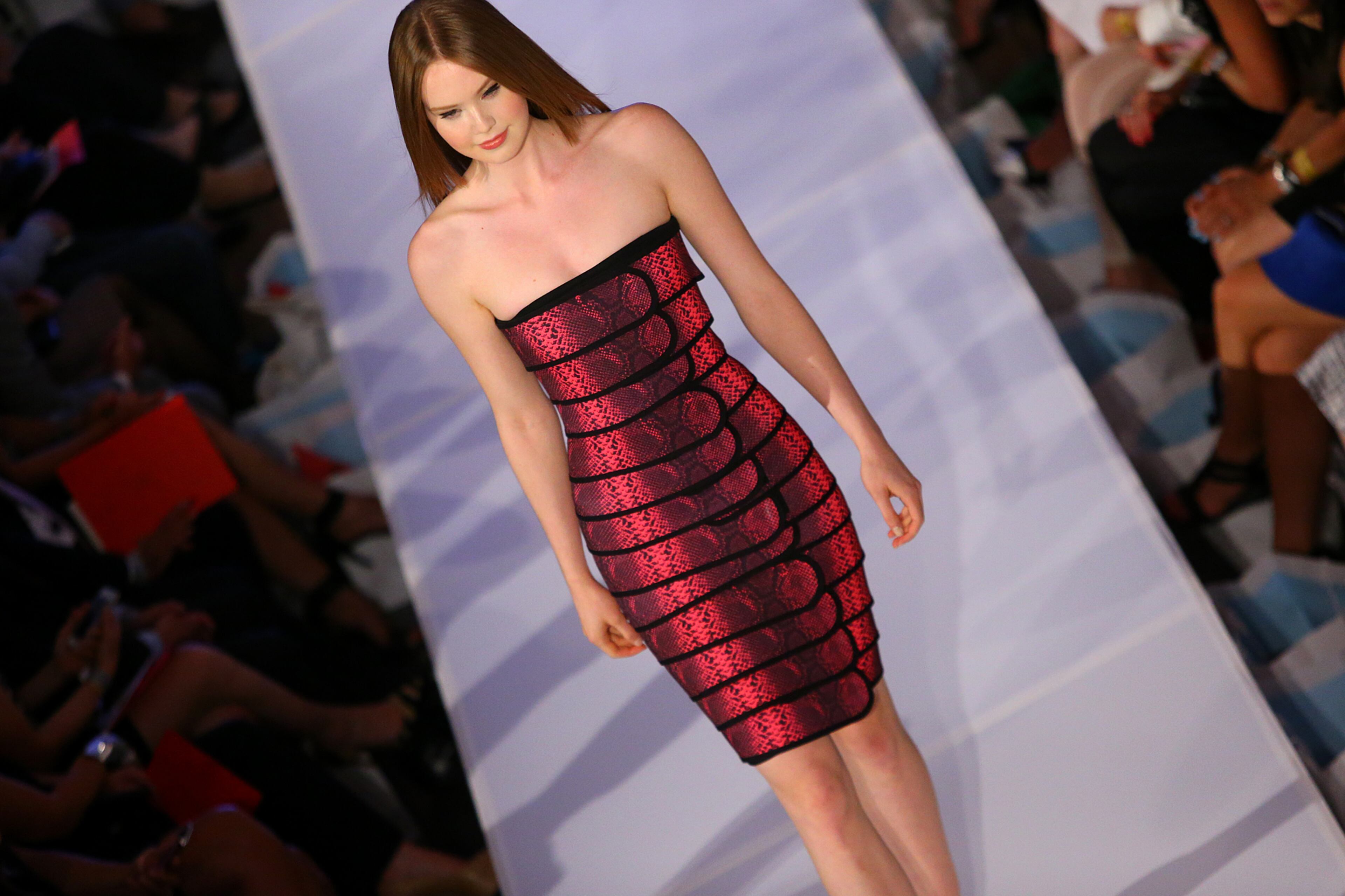 A model walks the runway during the Jeffrey Cares Fashion Show Monday, Aug. 25, 2014, in Atlanta. The show raises awareness and funds for its beneficiaries the Susan G. Komen for the Cure Greater Atlanta Affiliate and the Atlanta AIDS Fund. CURTIS COMPTON / CCOMPTON@AJC.COM
