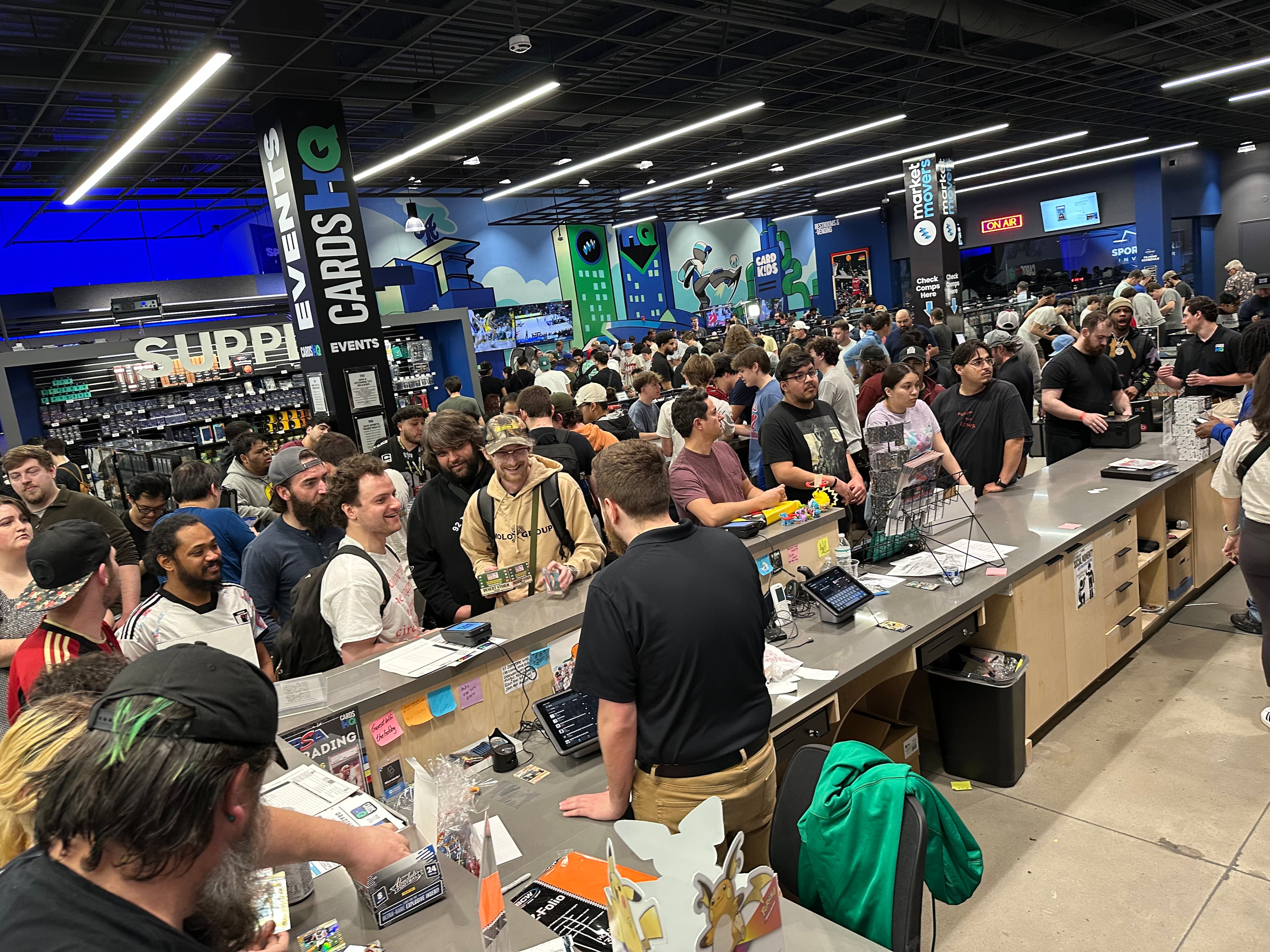 CardsHQ, a year-old Atlanta trading card retail shop, draws several hundred customers for trade night. RODNEY HO/rho@ajc.com