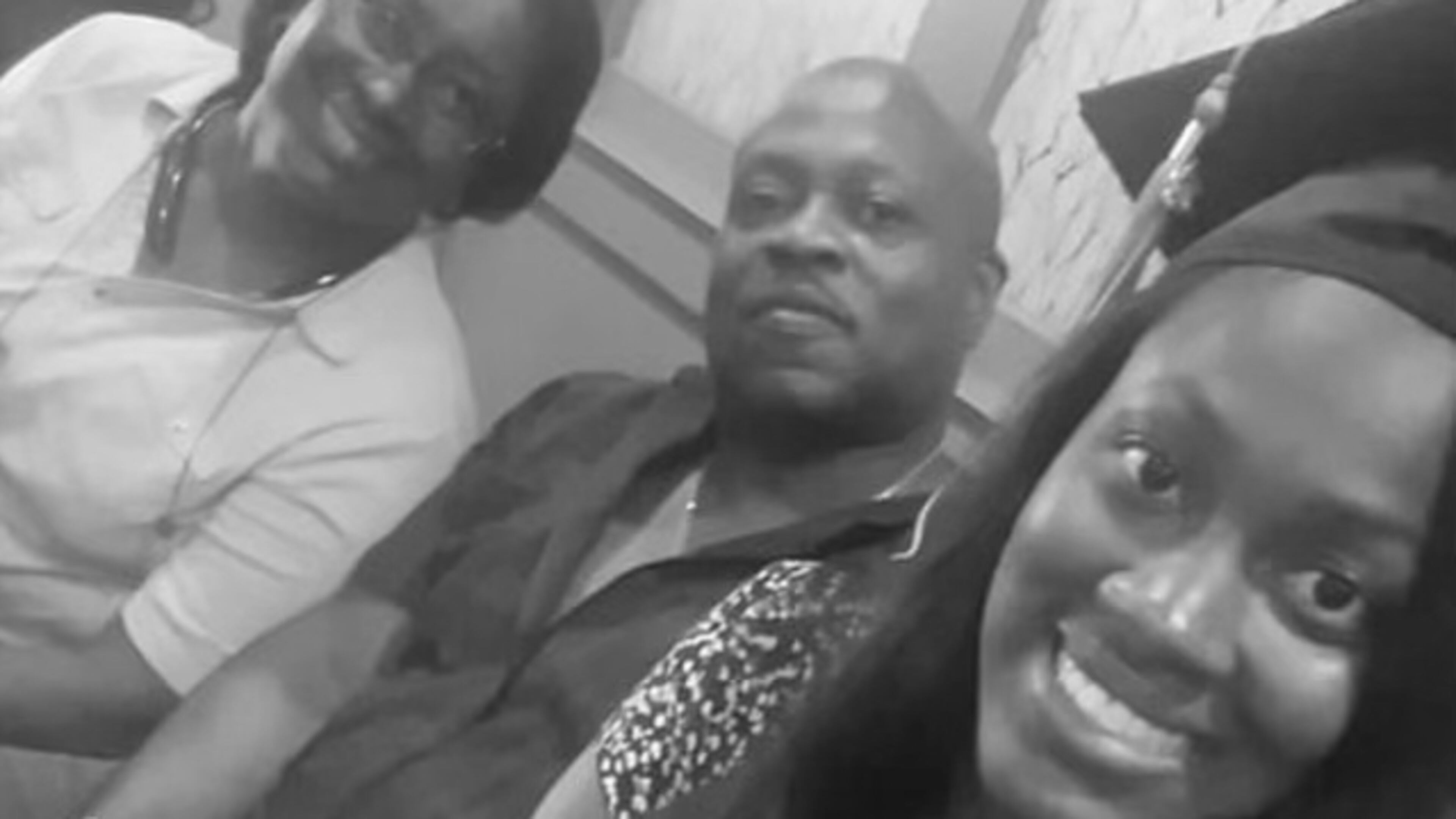 Michael Harris, shown with his wife and daughter, was burned Friday outside the Israeli Consulate in Midtown Atlanta.