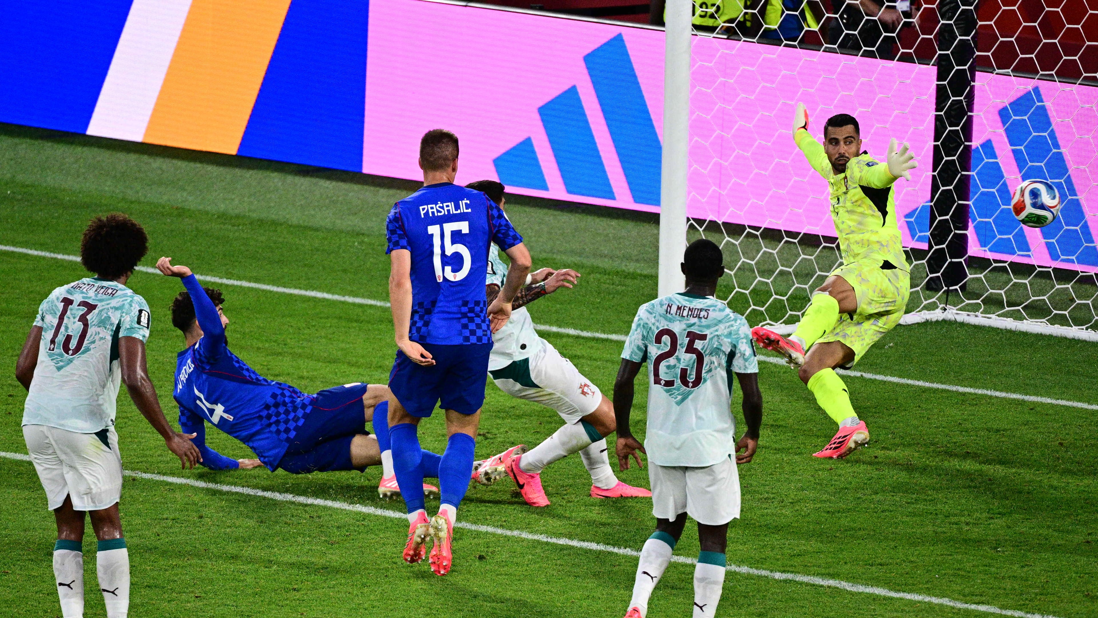 Croatia's Josko Gvardiol (4) scores a goal against Portugal goalkeeper Diego Costa (1) that was later taken back due to an offside call, during the second half of a World Cup round of 32 soccer match, in Toronto on Thursday, July 2, 2026. (Sammy Kogan/The Canadian Press via AP)