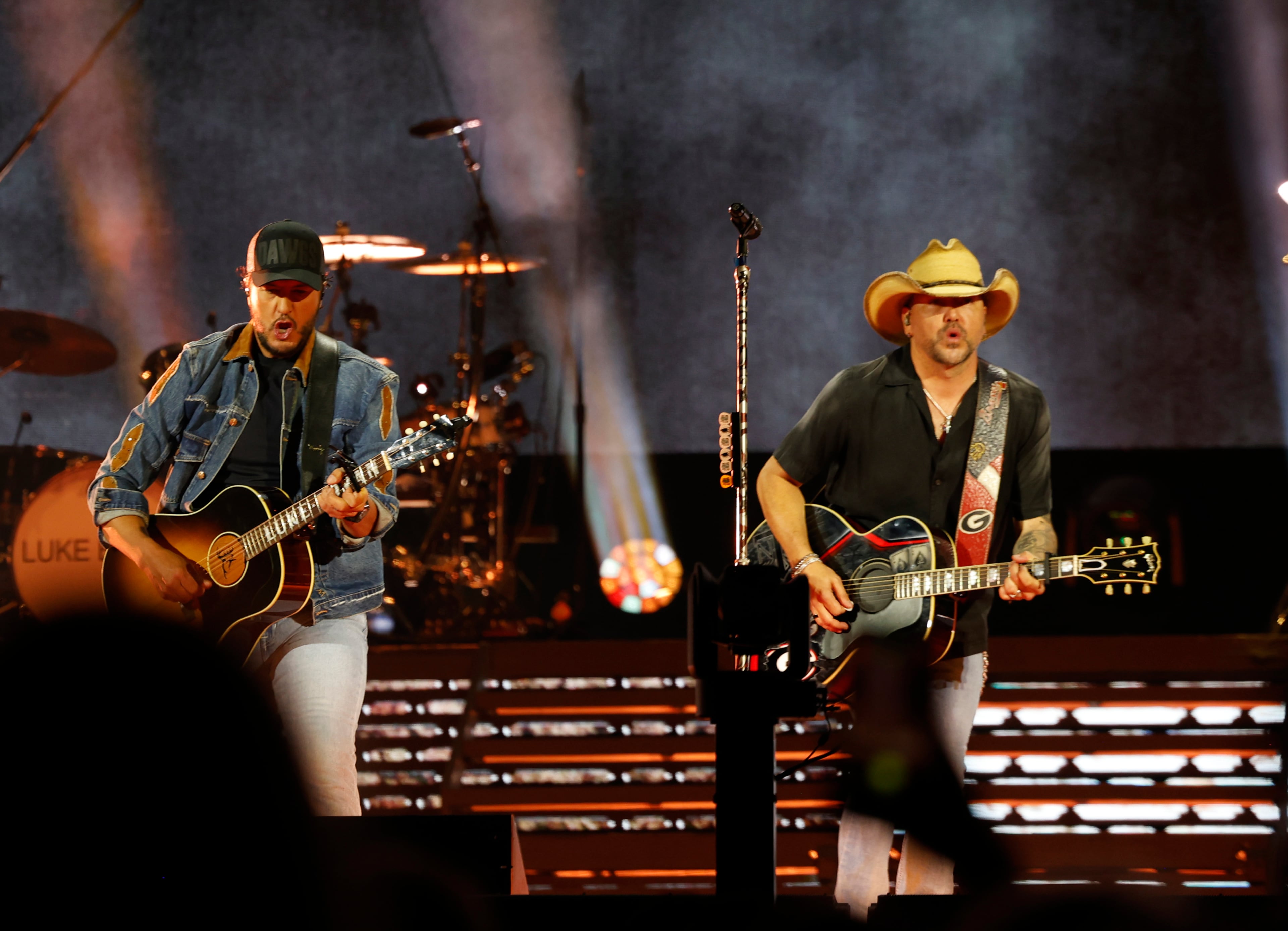 Georgia natives Jason Aldean (right) and Luke Bryan perform together for the first "Live Between the Hedges Concert Presented by PruittHealth" at Sanford Stadium, home of the University of Georgia football team, Saturday, April 25, 2026, in Athens. (Akili-Casundria Ramsess/EyeAkili Media)