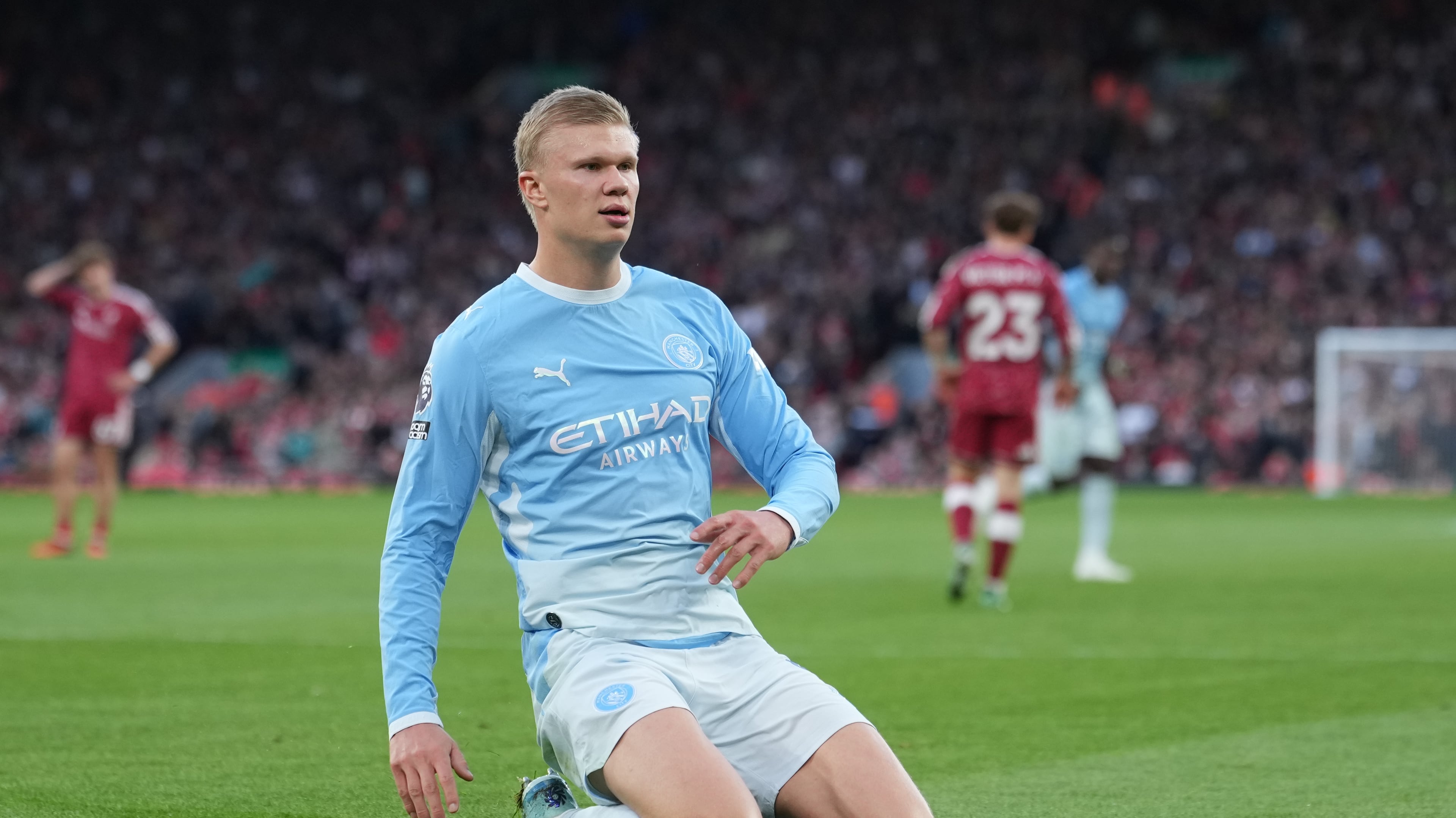 Manchester City's Erling Haaland celebrates after scoring his side's opening goal during the English Premier League soccer match between Liverpool and Manchester City in Liverpool, England, Sunday, Oct. 11, 2026. (AP Photo/Jon Super)