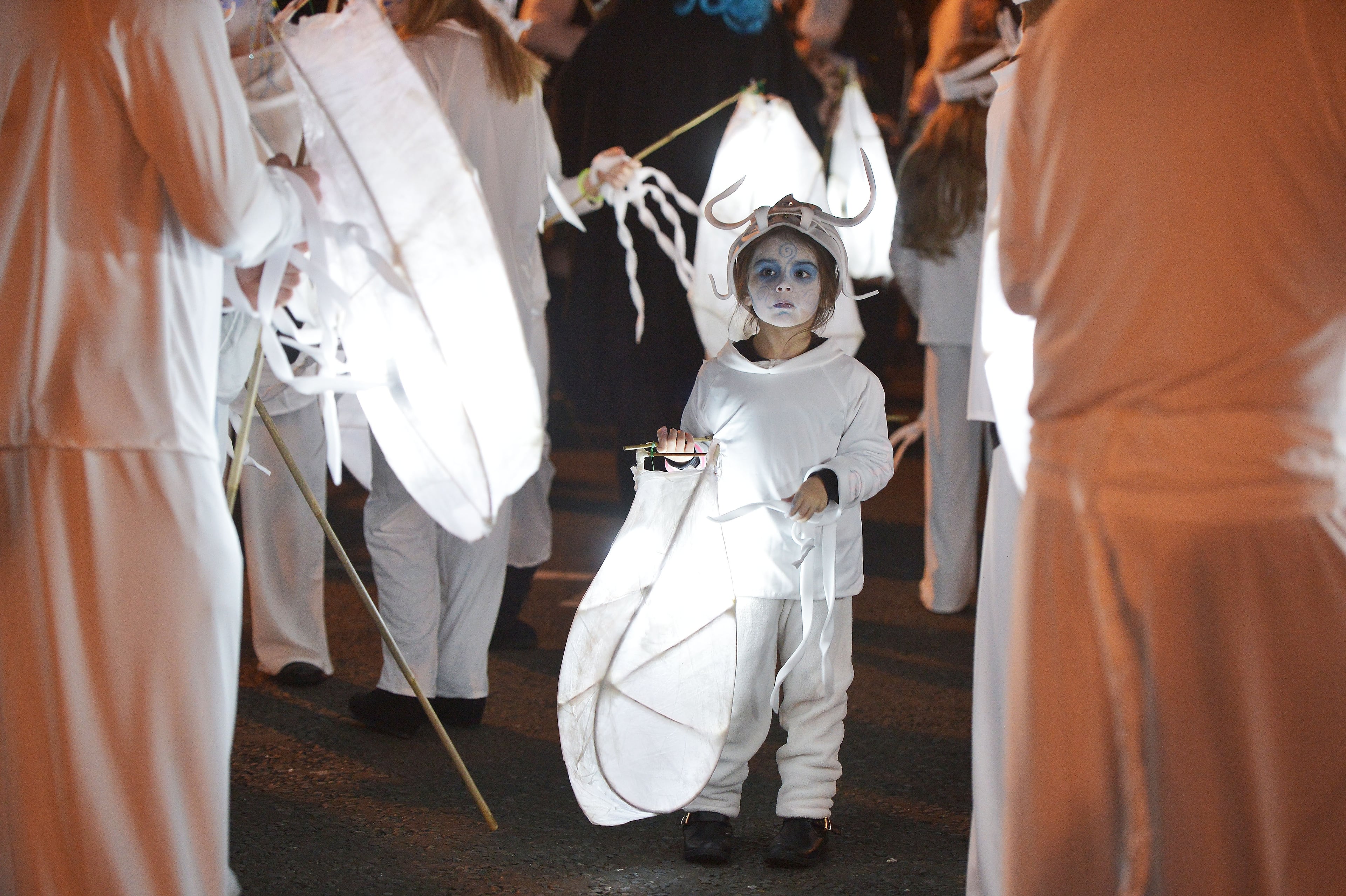 LONDONDERRY, NORTHERN IRELAND - OCTOBER 31: Performers make their way along the parade route as over 30,000 people take part in Europe's largest Halloween street parade on October 31, 2015 in Londonderry, Northern Ireland. Derry has established itself as the number one Halloween destination in the world according to a recent poll with visitors and enthusiasts taking part in the week long City of Bones festivities. (Photo by Charles McQuillan/Getty Images)