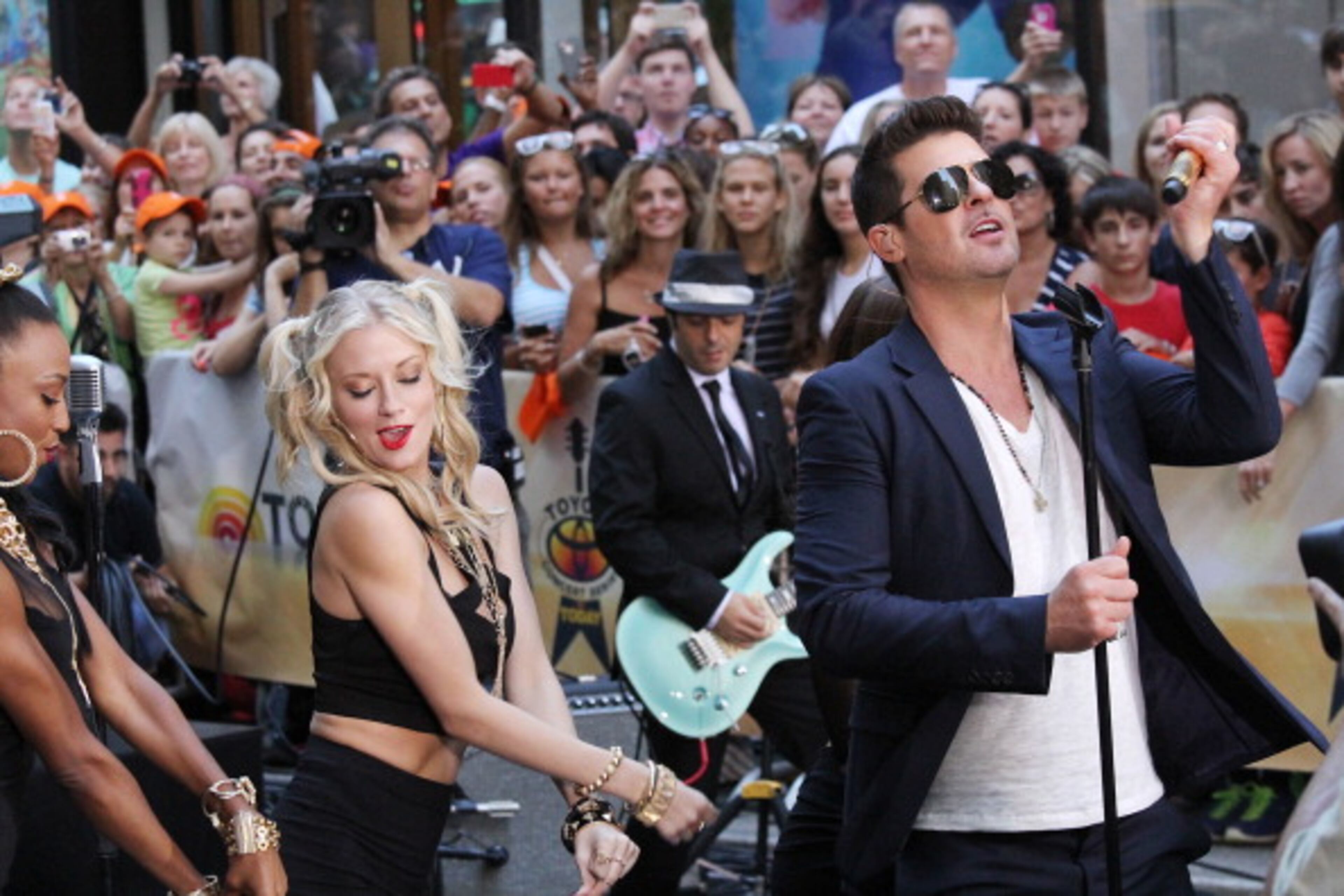 NEW YORK, NY - JULY 30: Robin Thicke performs at NBC's TODAY Show on July 30, 2013 in New York City. (Photo by Rob Kim/Getty Images)