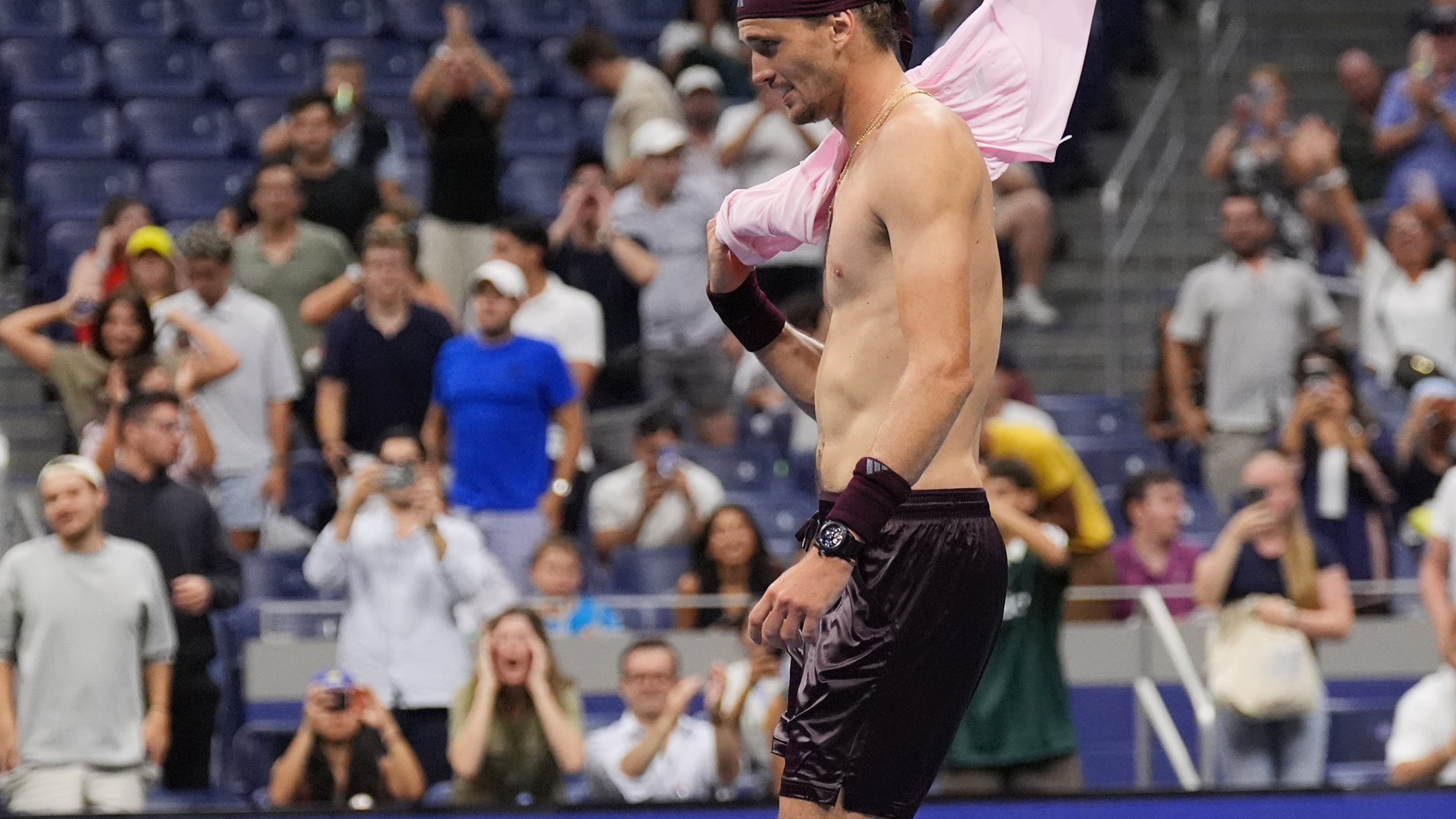 Alexander Zverev, of Germany, celebrates after defeating Quentin Halys, of France, in five sets in the the second round of the U.S. Open tennis championships, early Friday, Sept. 4, 2026, in New York. (AP Photo/Frank Franklin II)