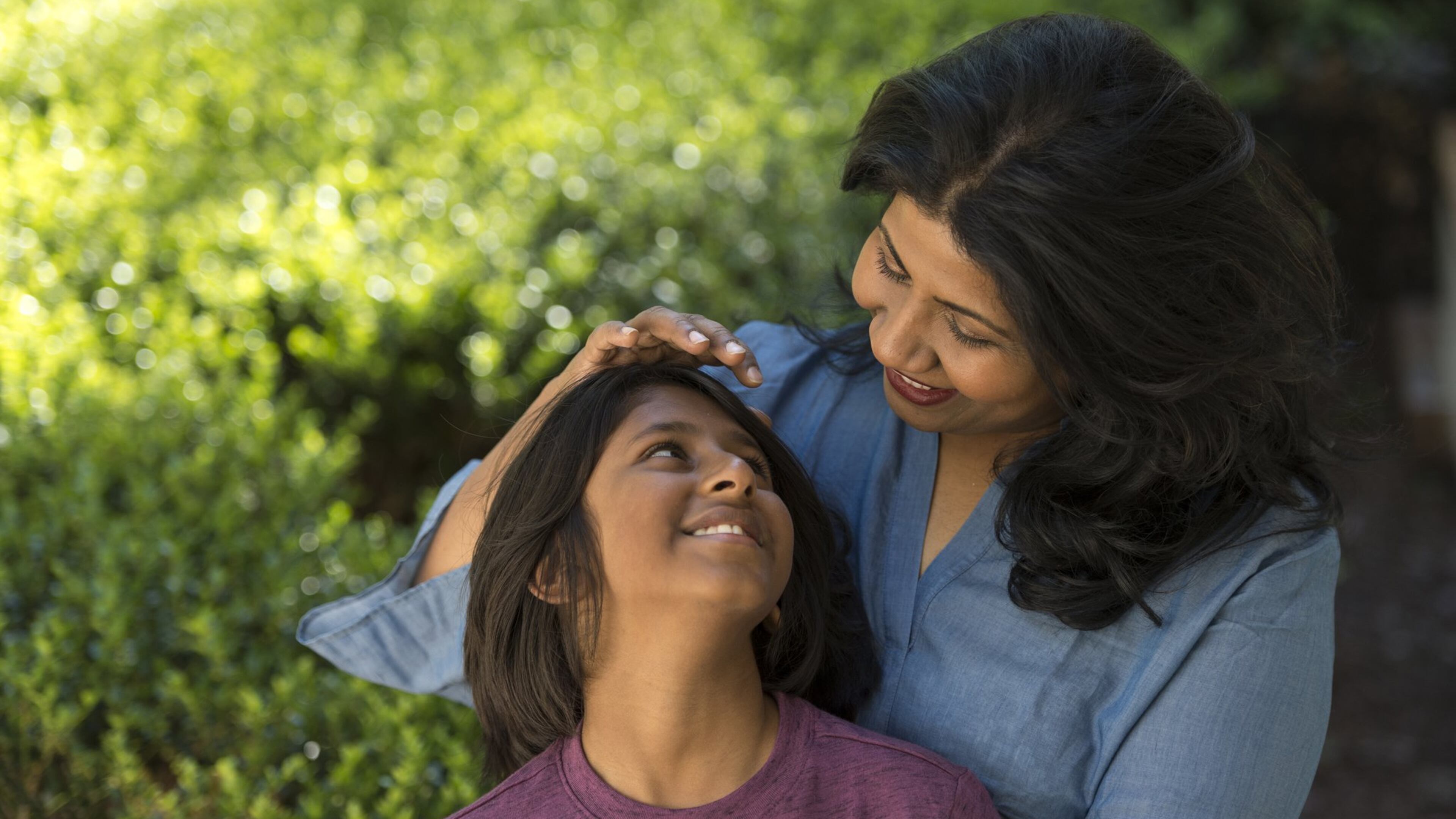Asha Gomez (right) and her son, Ethan Gomez-Palayam, pose for portraits at their home in Atlanta. When her son, Ethan, asked her what life was like before becoming a mom, she said, “It was beautiful but it was not this beautiful.” DAVID BARNES / DAVID.BARNES@AJC.COM