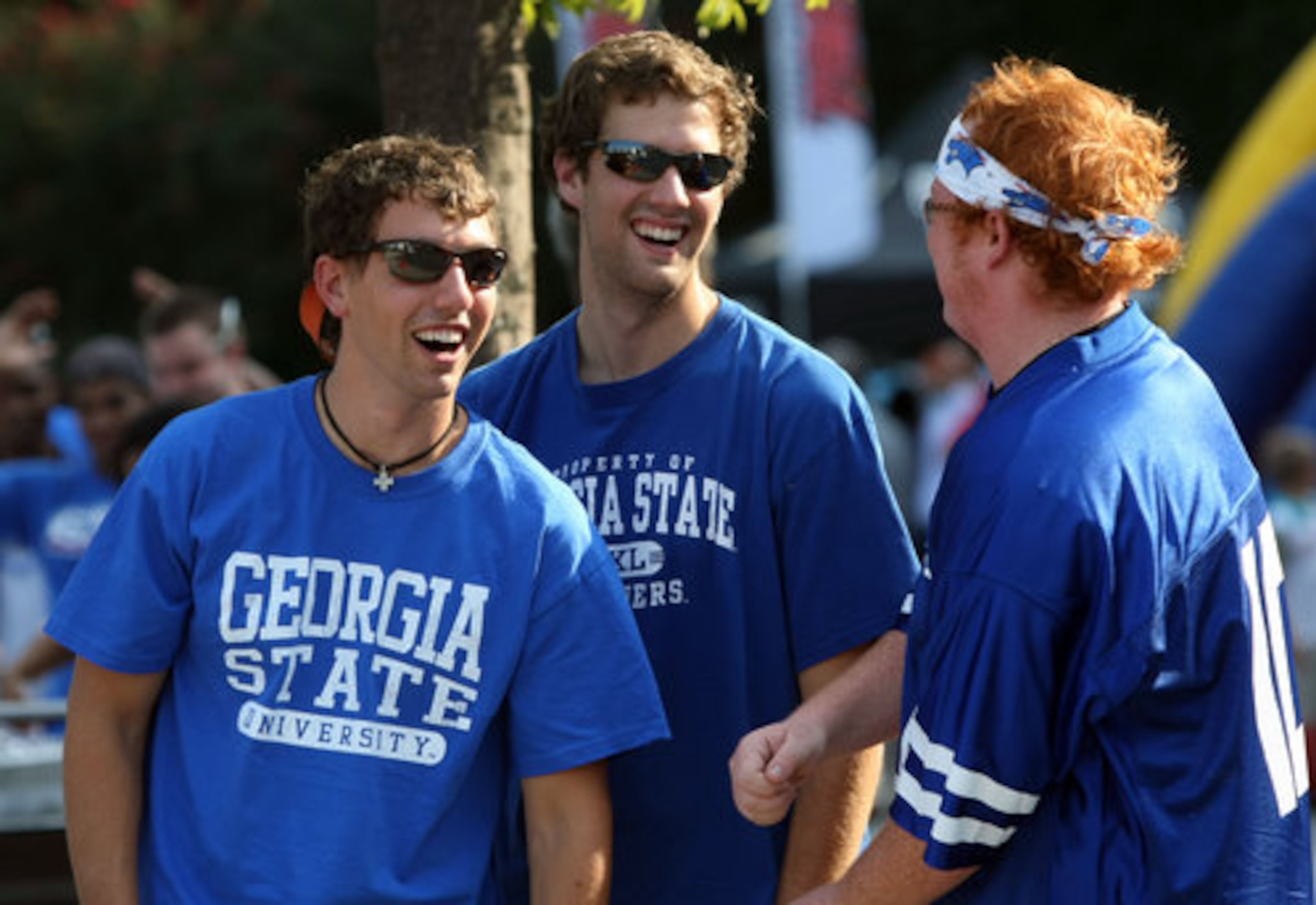 Georgia State University juniors from left to right; Jake Murray, of Atlanta, Chris Mylenbusch, of Marietta, and Logan McElroy, of Lawrenceville, enjoy themselves in the Panther Zone as they play a game of corn hole in preparation for GSU's inaugural game against Shorter College in the Georgia Dome Thursday night in Atlanta, Ga., Sept. 2, 2010.