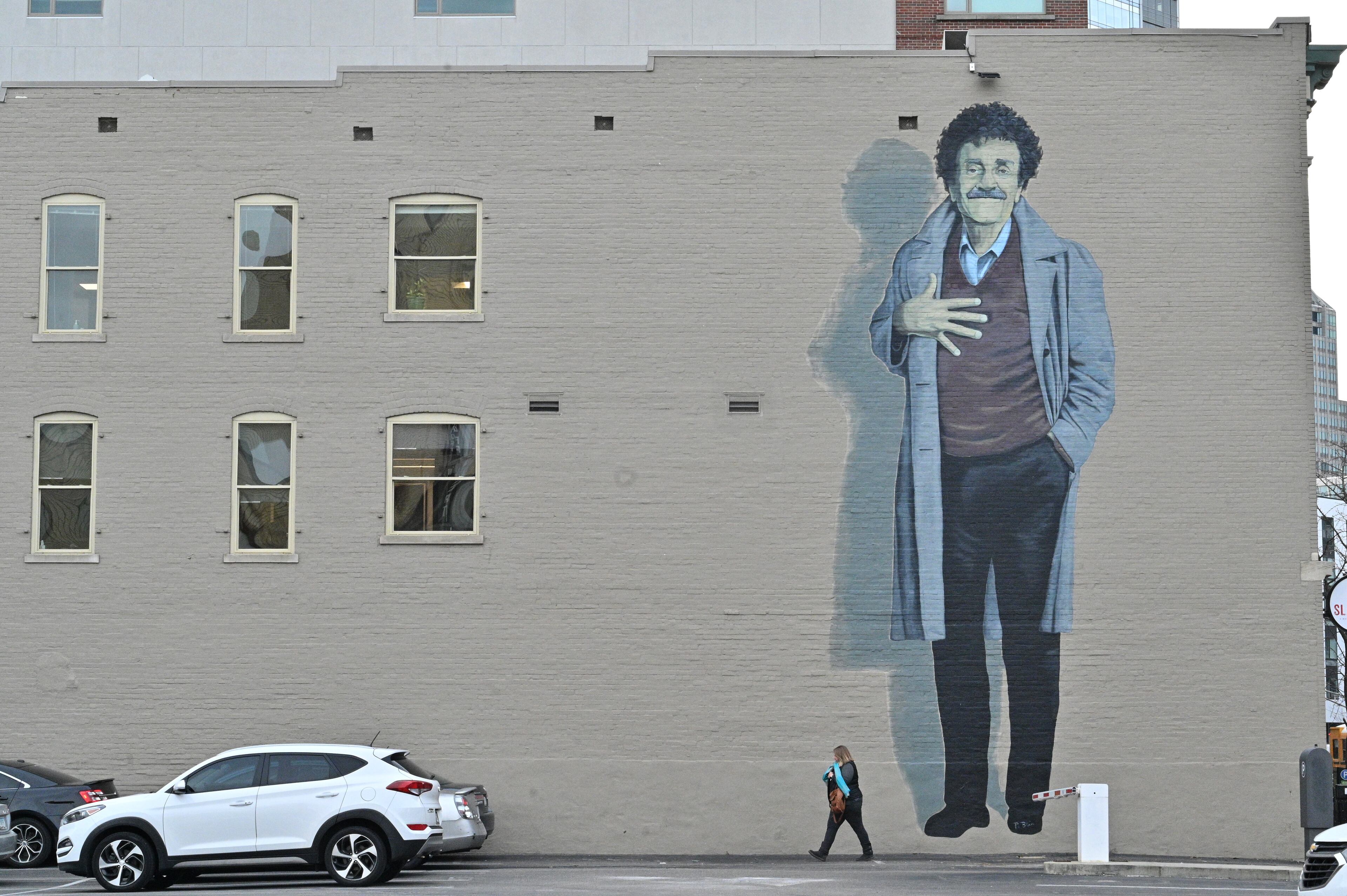 January 6, 2022 Indianapolis, IN - Photo shows one of landmarks, Kurt Vonnegut mural, in downtown Indianapolis on Thursday, January 6, 2022. This mural of a 38-foot-tall Vonnegut was created by artist Pamela Bliss using a compilation of images. Downtown Indianapolis set to host the 2022 College Football Playoff National Championship game between Georgia and Alabama. (Hyosub Shin / Hyosub.Shin@ajc.com)
