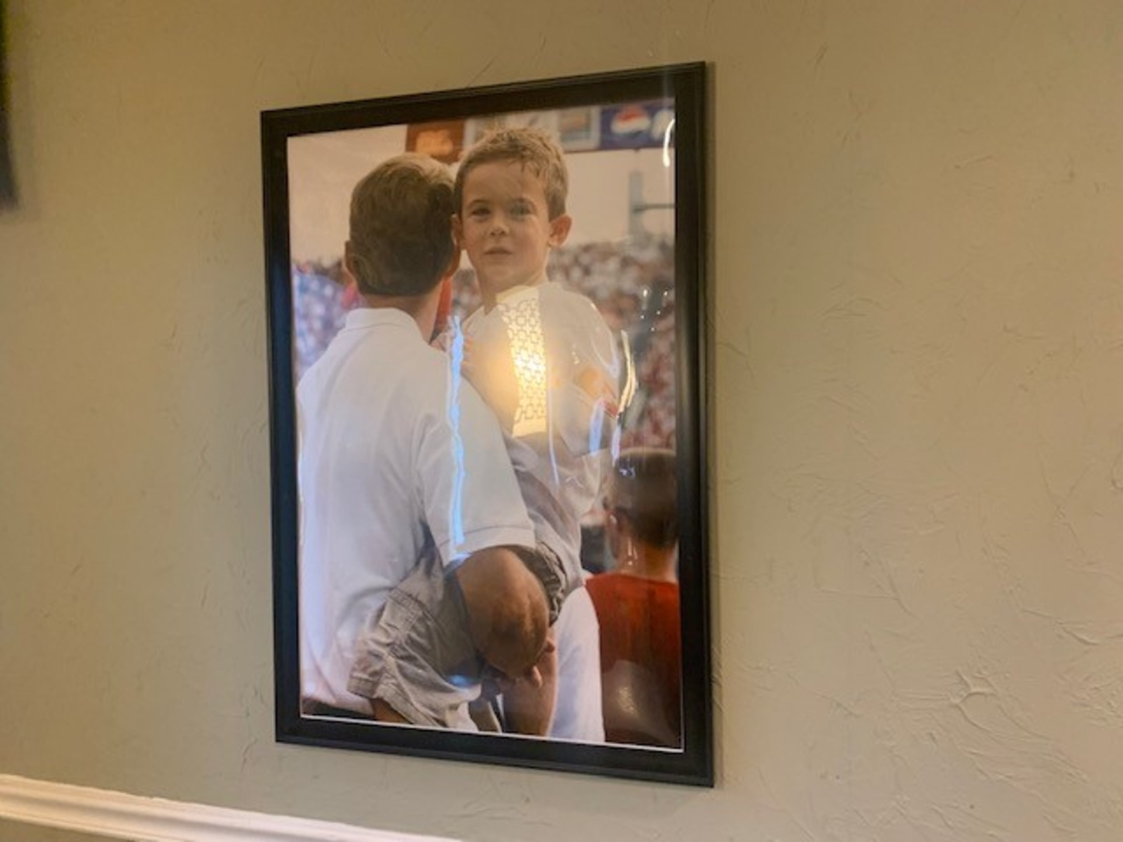 Photos of a young Stetson Bennett hang on the wall of the Oak Plaza Restaurant in Blackshear, Ga.