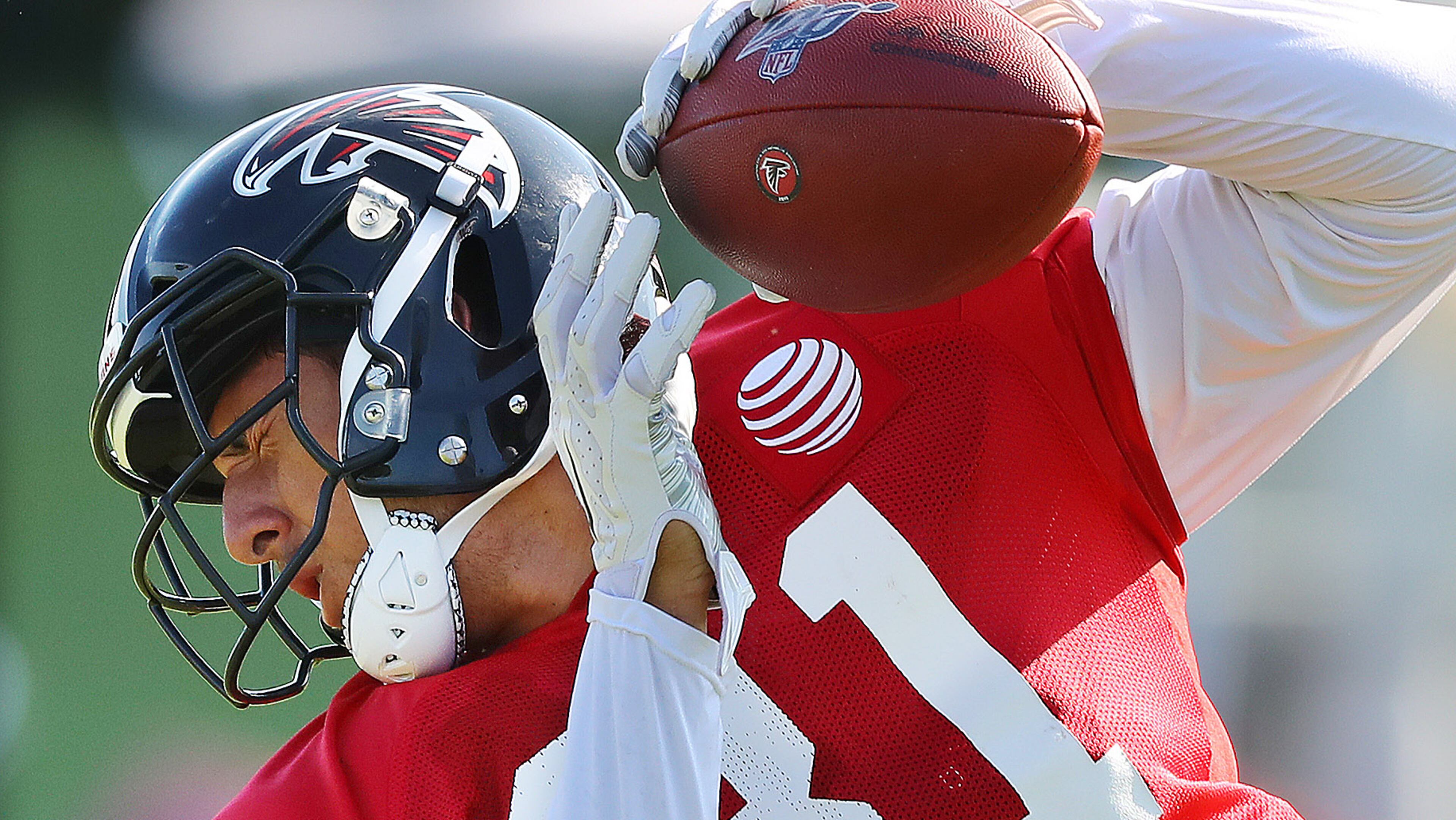 Falcons tight end Austin Hooper secured the ball after a reception during training camp practice Thursday, July 25, 2019, in Flowery Branch.