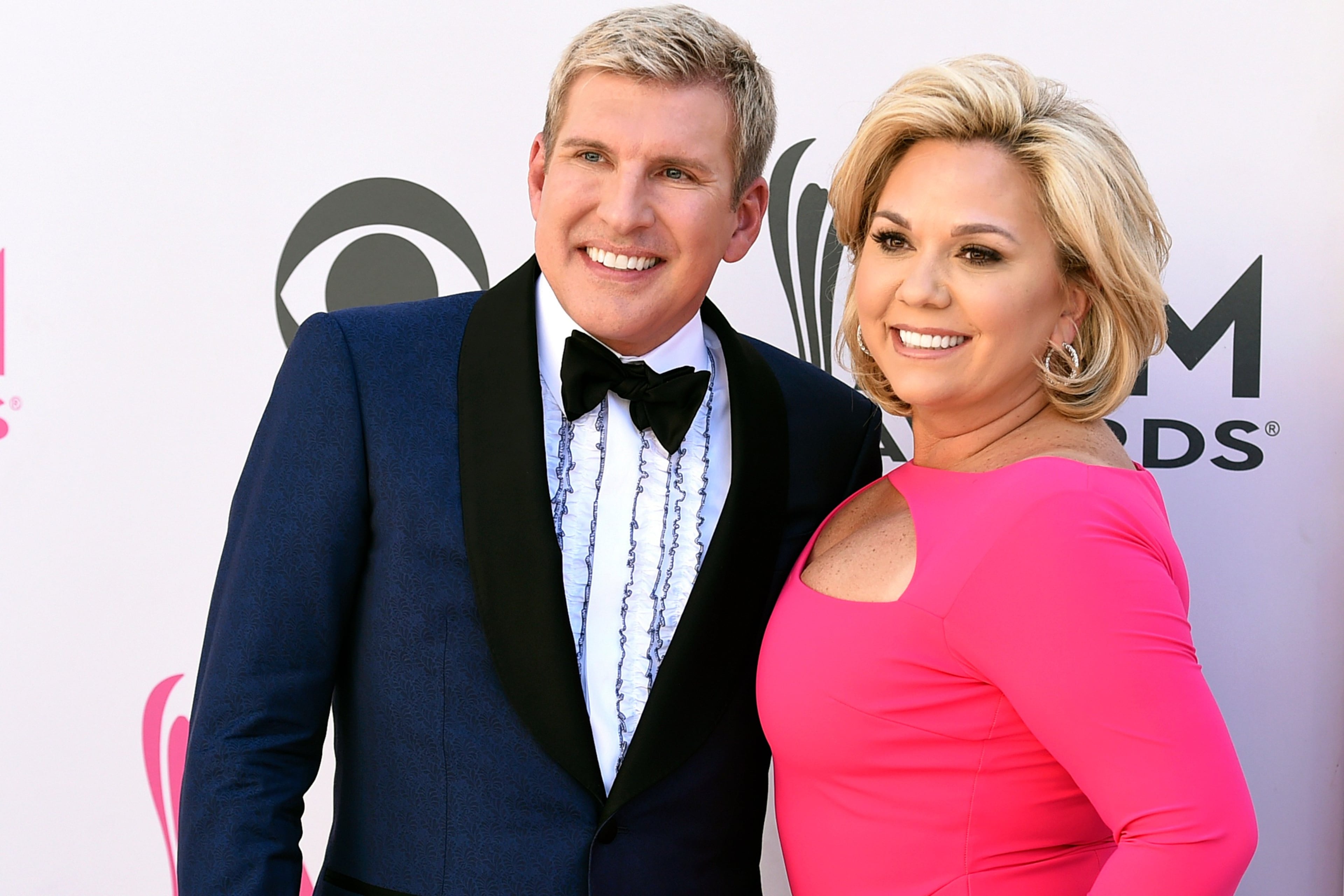 Julie Chrisley, right, and her husband Todd Chrisley, seen here in 2017. (Jordan Strauss/Invision/AP)