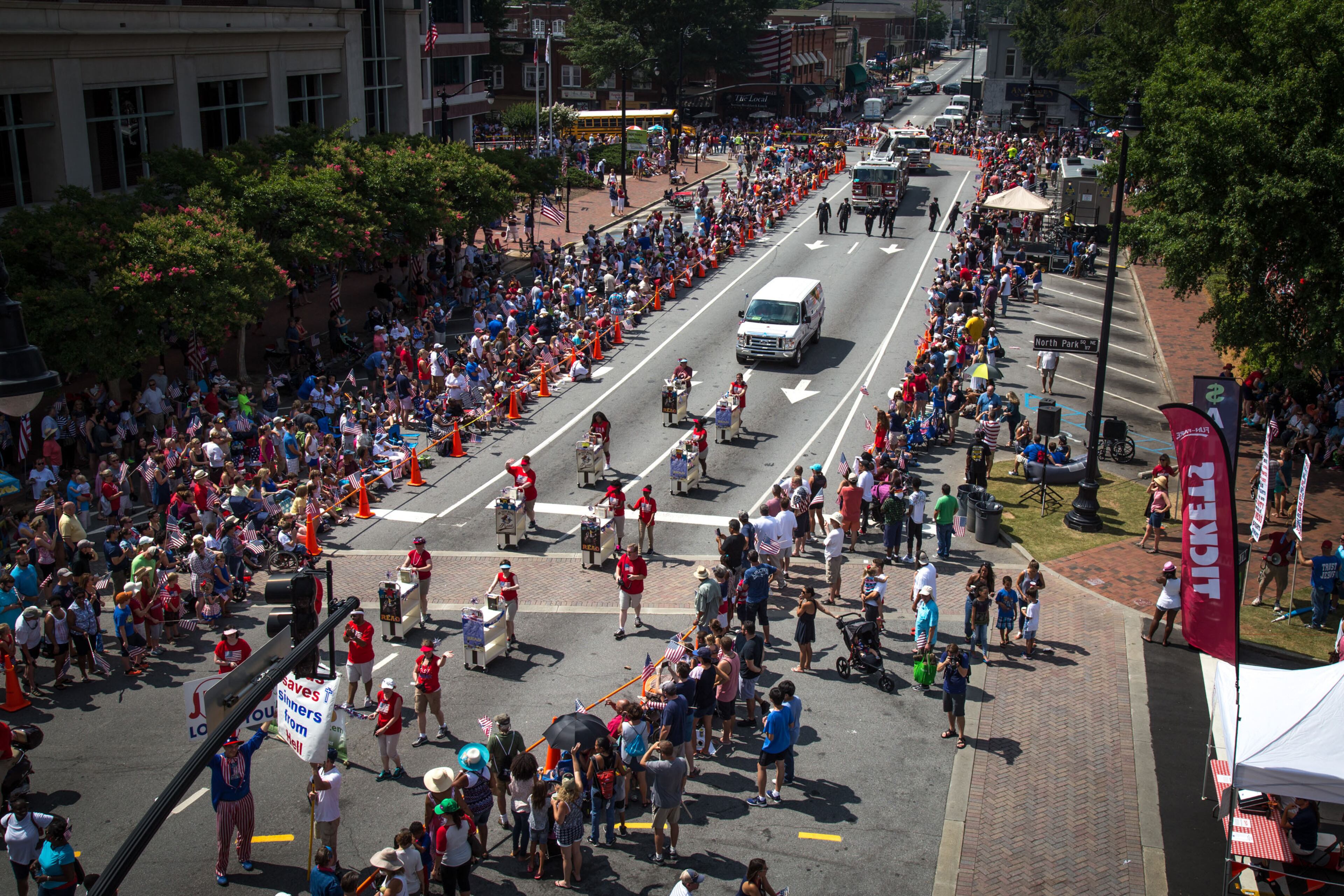 The Marietta Freedom Parade makes its way through the Marietta Square on Tuesday, July 4, 2016, In Marietta, GA. An estimated 30,000 spectators turned out for the parade. STEVE SCHAEFER / SPECIAL TO THE AJC