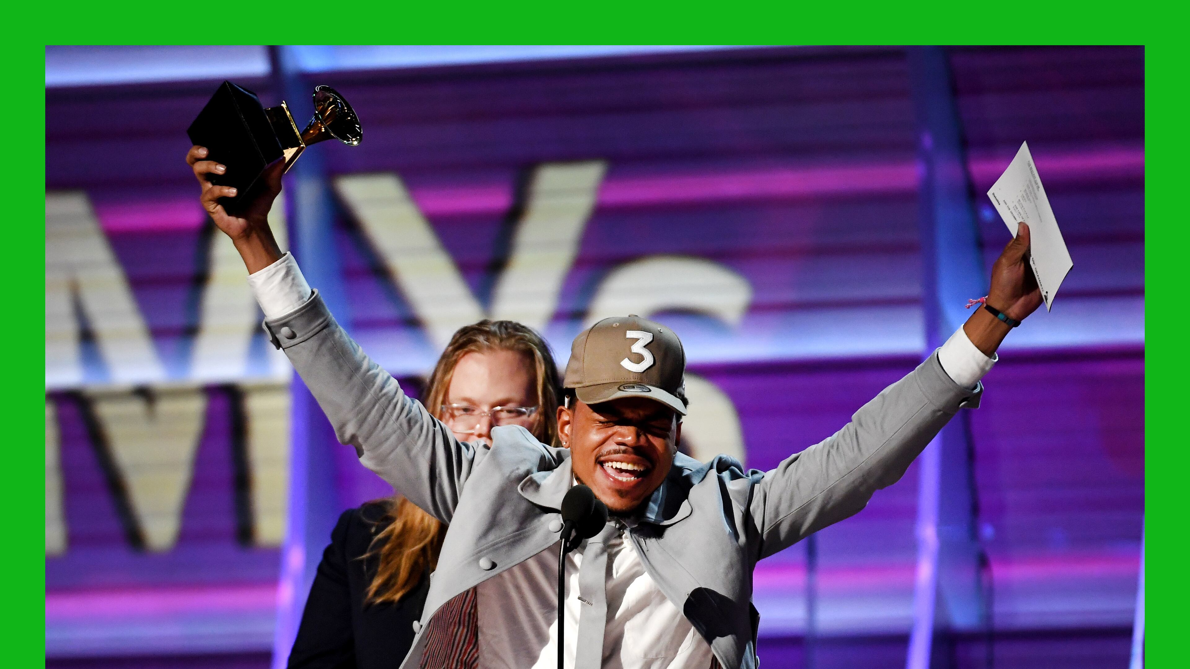 An exuberant Chance The Rapper accepts the award for Best Rap Album at the 59th annual Grammy Awards. (Photo by Kevork Djansezian/Getty Images)