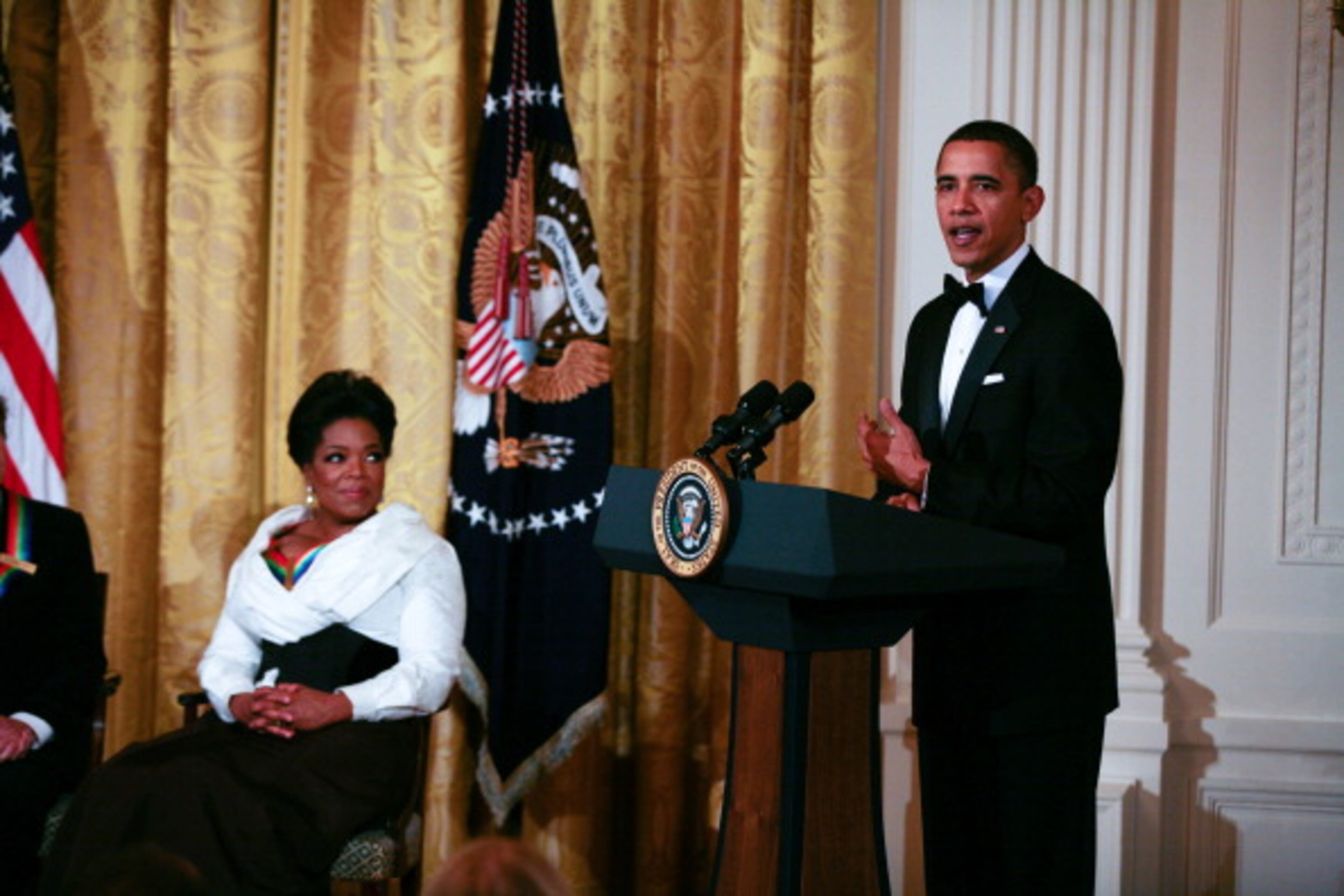 WASHINGTON, DC - DECEMBER 5: U.S. President Barack Obama speaks during the 2010 Kennedy Center Honorees to a reception in the East Room of the White House before going to the Kennedy Center on December 5, 2010 in Washington, DC. The recipients for the 33rd annual awards are singer and songwriter Merle Haggard, composer and lyricist Jerry Herman; dancer, choreographer and director Bill T. Jones, songwriter and musician Paul McCartney, and producer, television host and actress Oprah Winfrey. (Photo by Gary Fabiano - Pool/Getty Images)