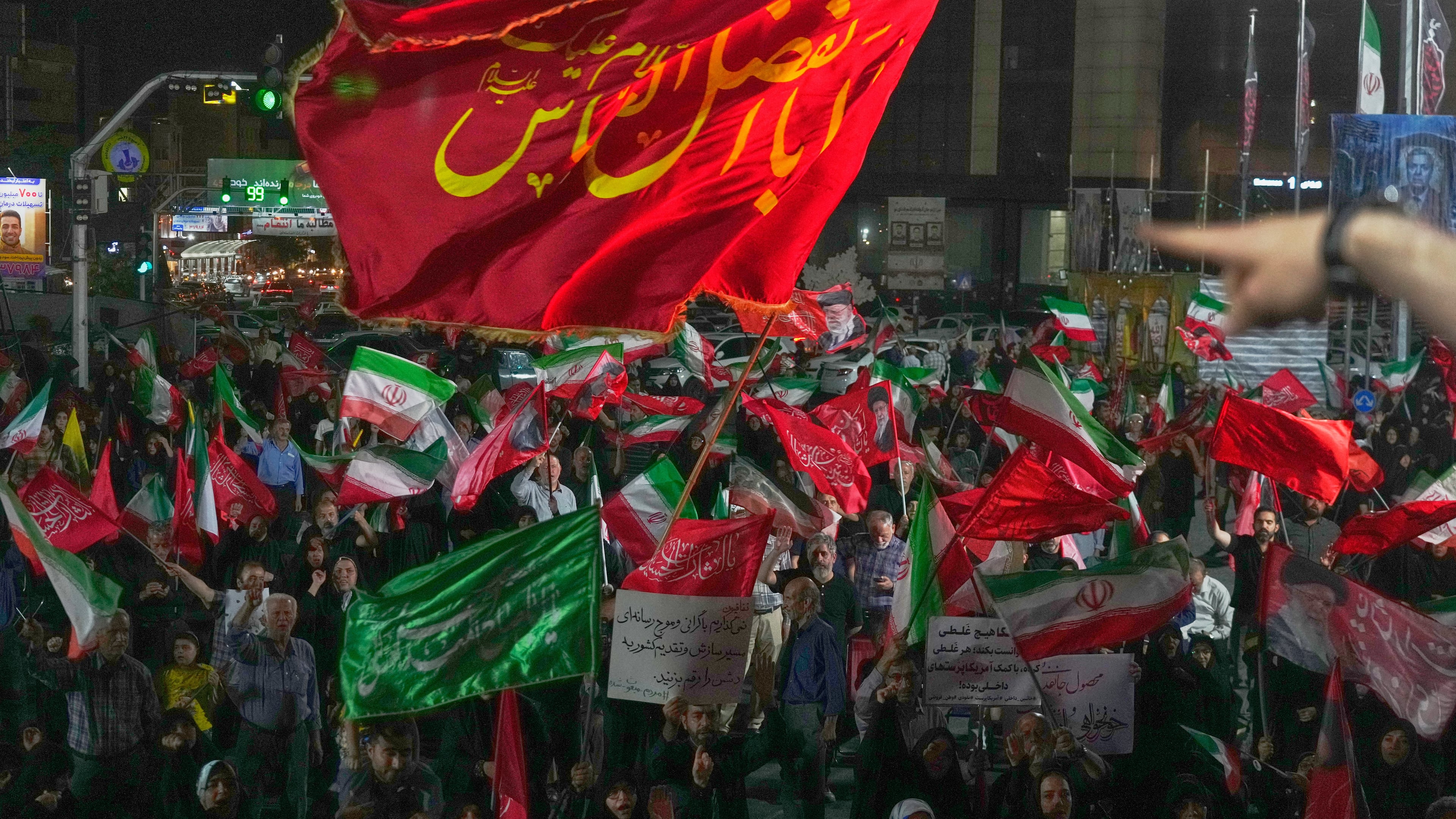 Pro-government demonstrators gather at a square in Tehran, Friday, July 17, 2026. (AP Photo/Vahid Salemi)