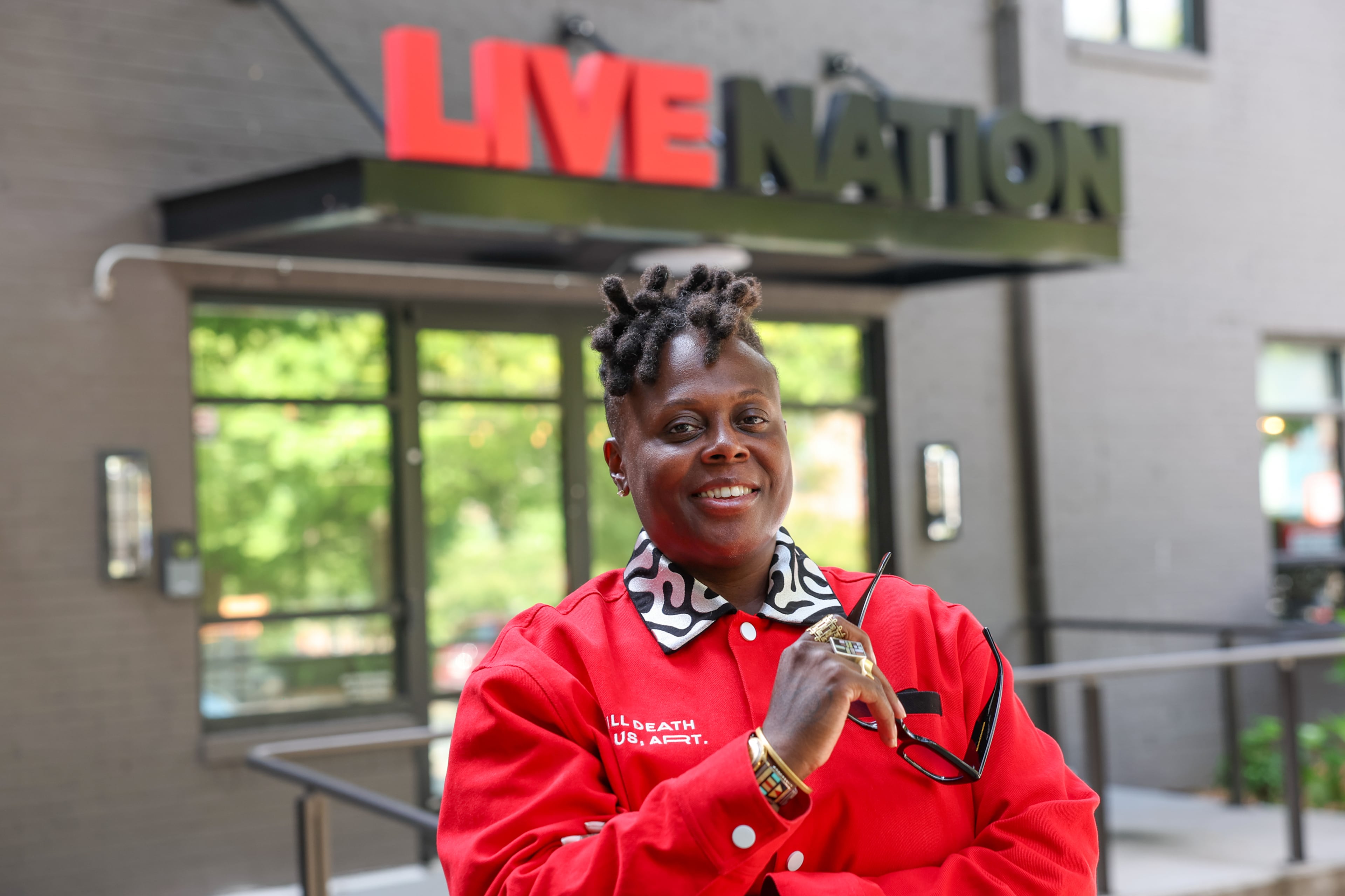 Third & Hayden founder Kei Henderson outside her Live Nation office in Atlanta on Aug. 28, 2026. (Arvin Temkar/AJC)