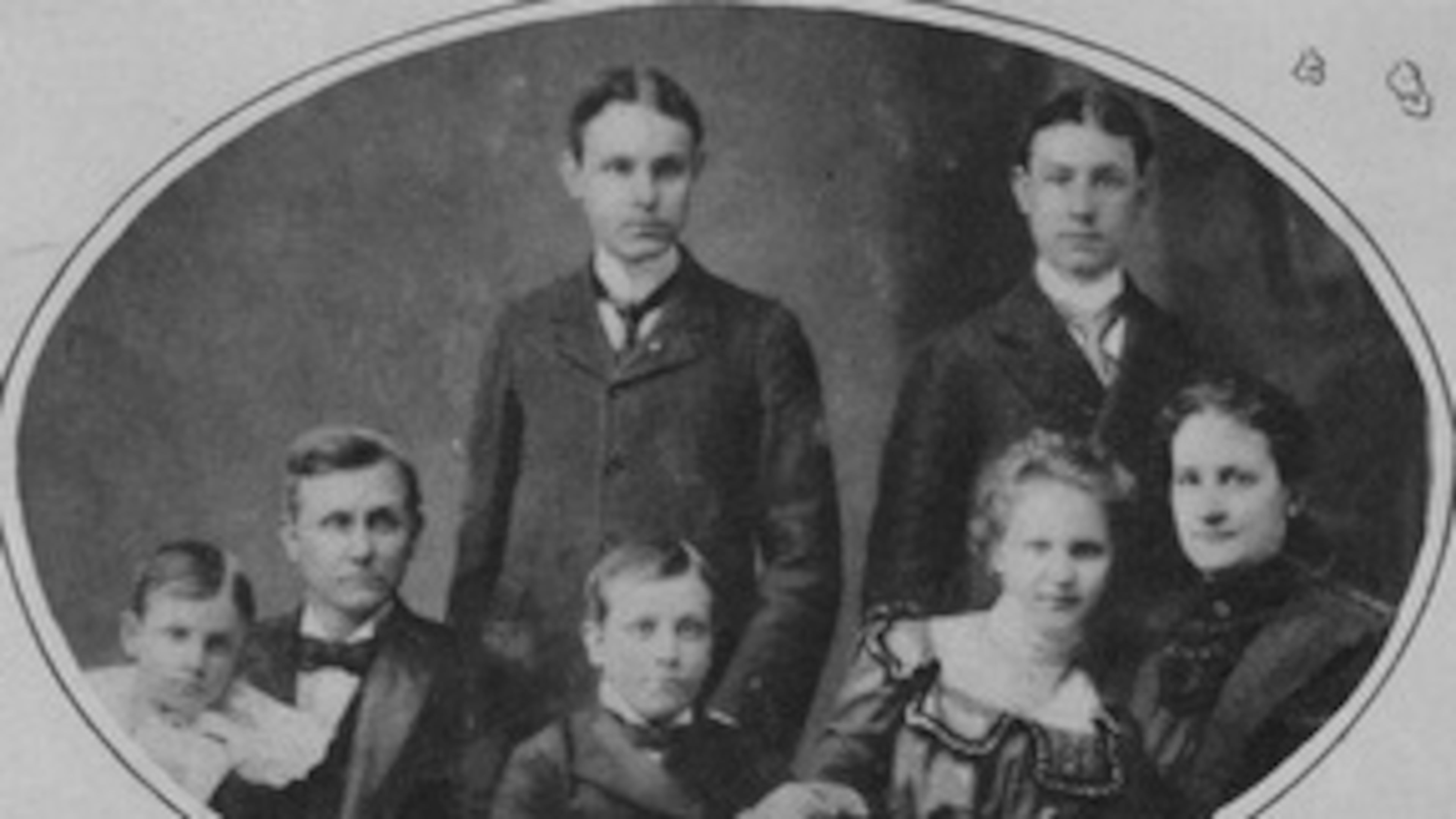 The Candlers in 1895: (counterclockwise, from bottom left) William, Asa, Walter, daughter Lucy, mother Lucy, Charles Howard, and Asa Jr.