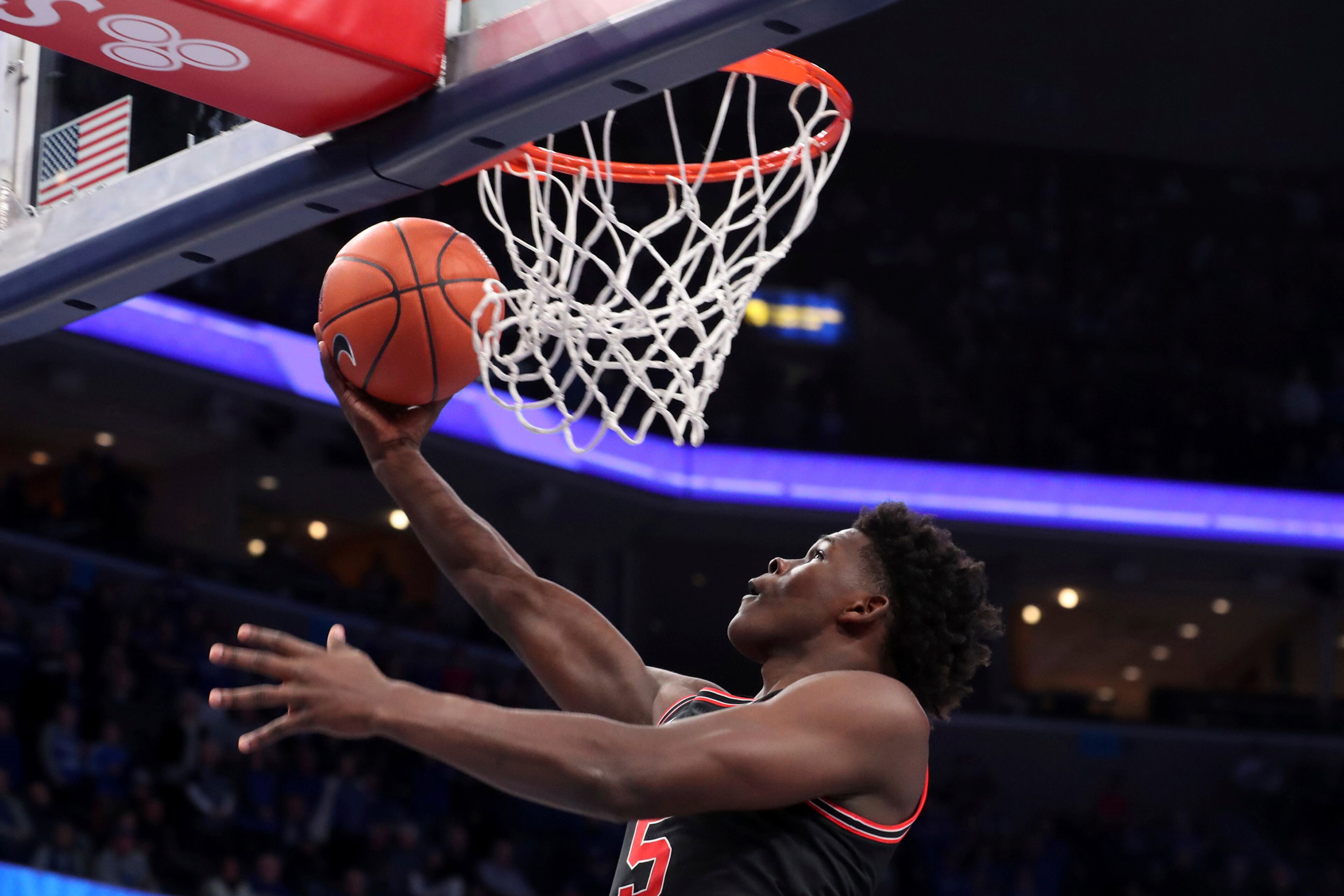Georgias' guard Anthony Edwards ( 5 ) goes up for a shot in the first half of an NCAA college basketball game against Memphis, Saturday, Jan. 4, 2020, in Memphis, Tenn. (AP Photo/Karen Pulfer Focht)