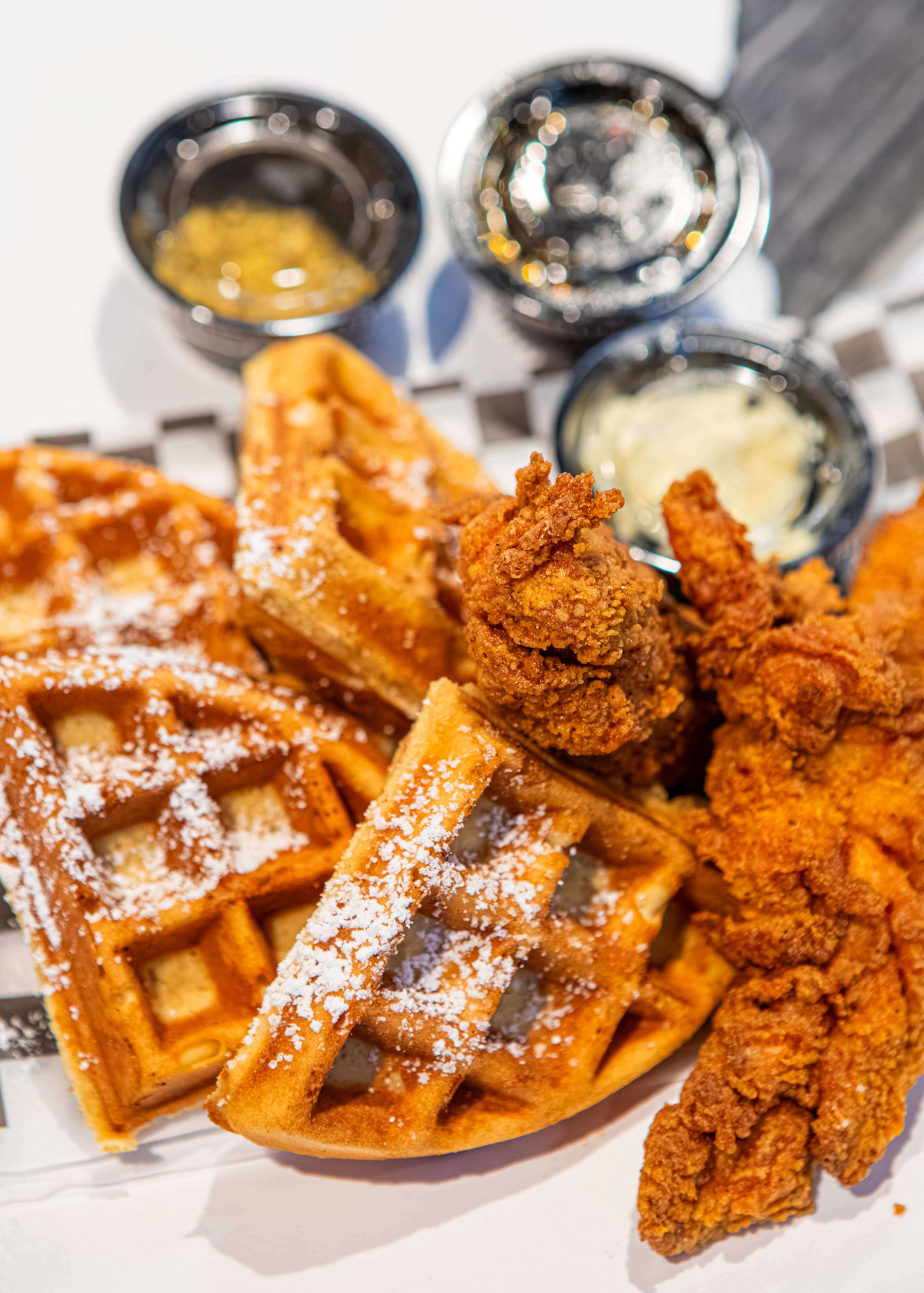 Johnny's World Famous Chicken and Waffles offers a Southern classic on Concourse E. (Aaliyah Man for the AJC)
