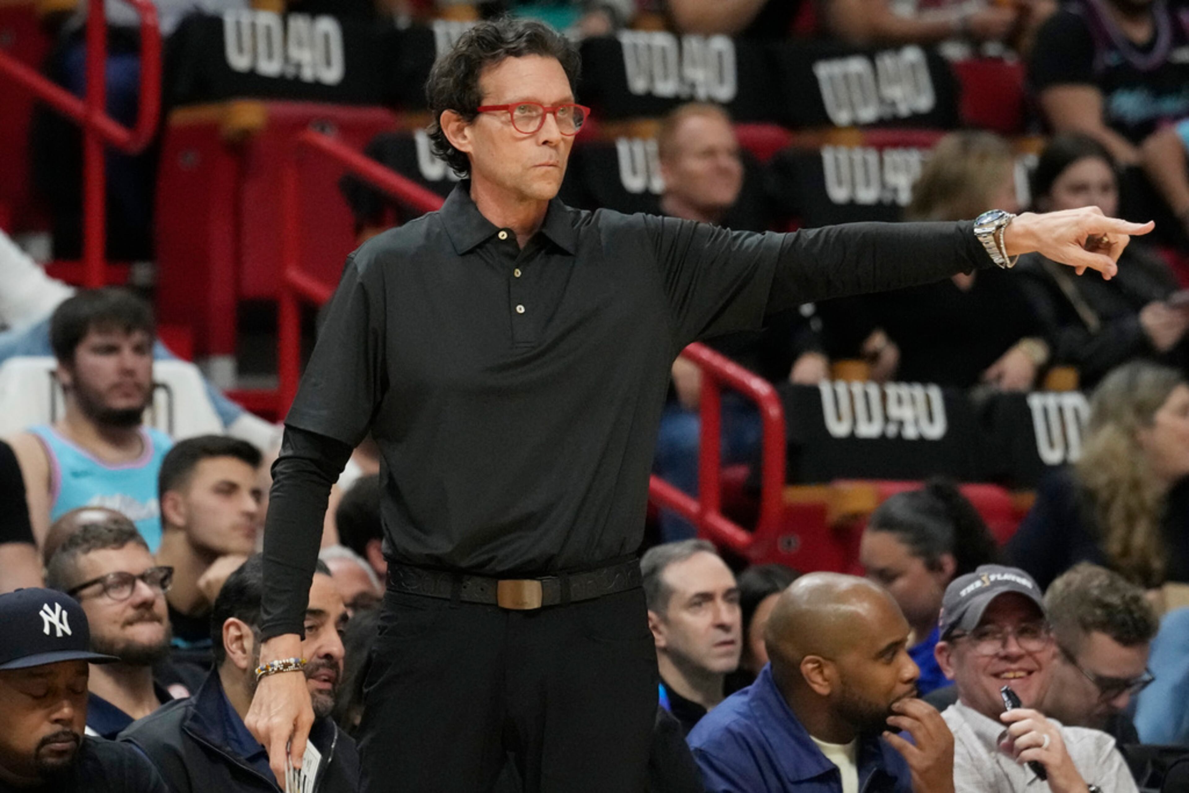 Atlanta Hawks head coach Quin Snyder gestures during the first half of an NBA basketball game against the Miami Heat, Friday, Jan. 19, 2024, in Miami. (AP Photo/Marta Lavandier)