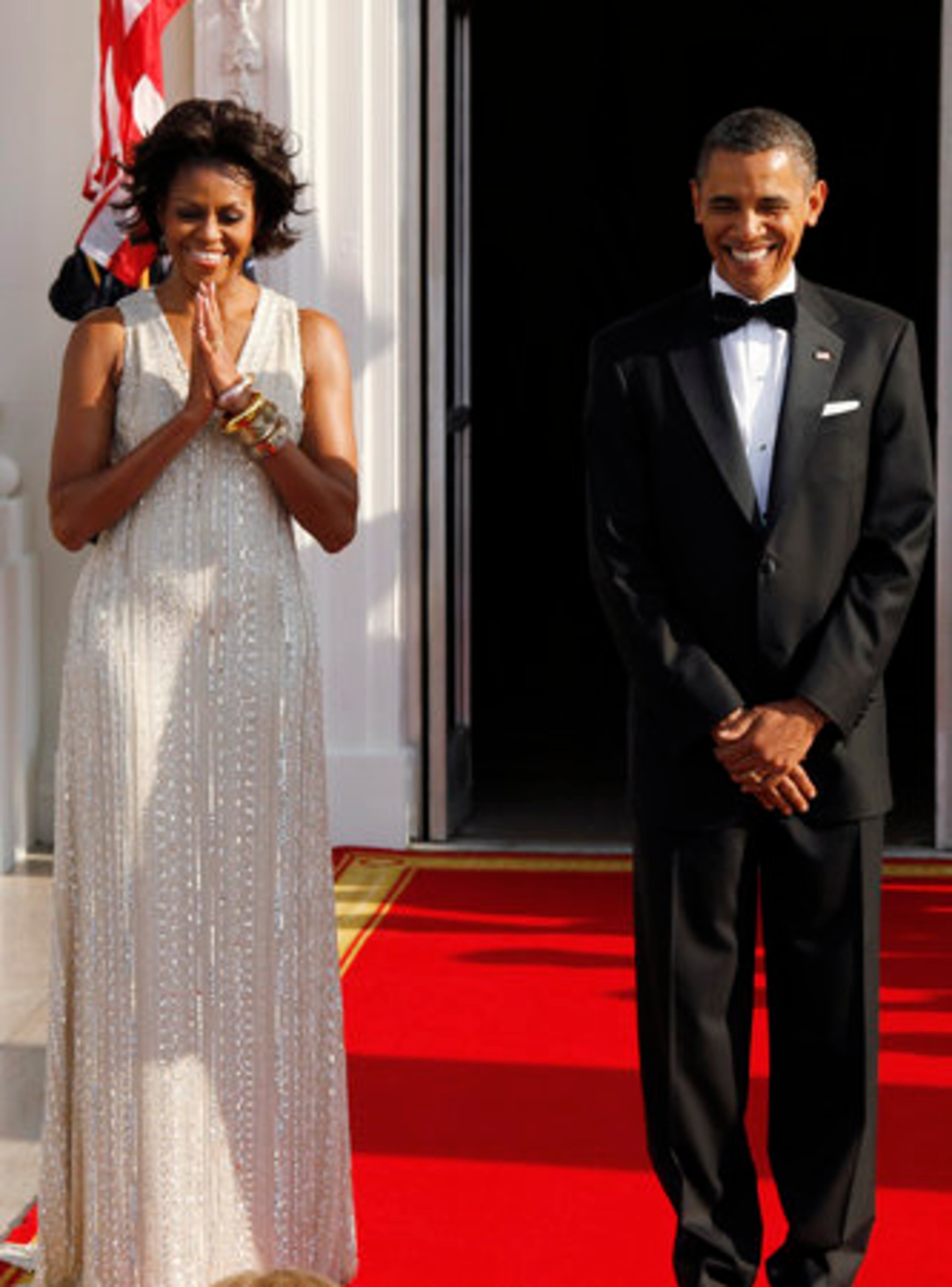First lady Michelle Obama and President Barack Obama welcome German Chancellor Angela Merkel to the White House on Tuesday, June 7 2011.