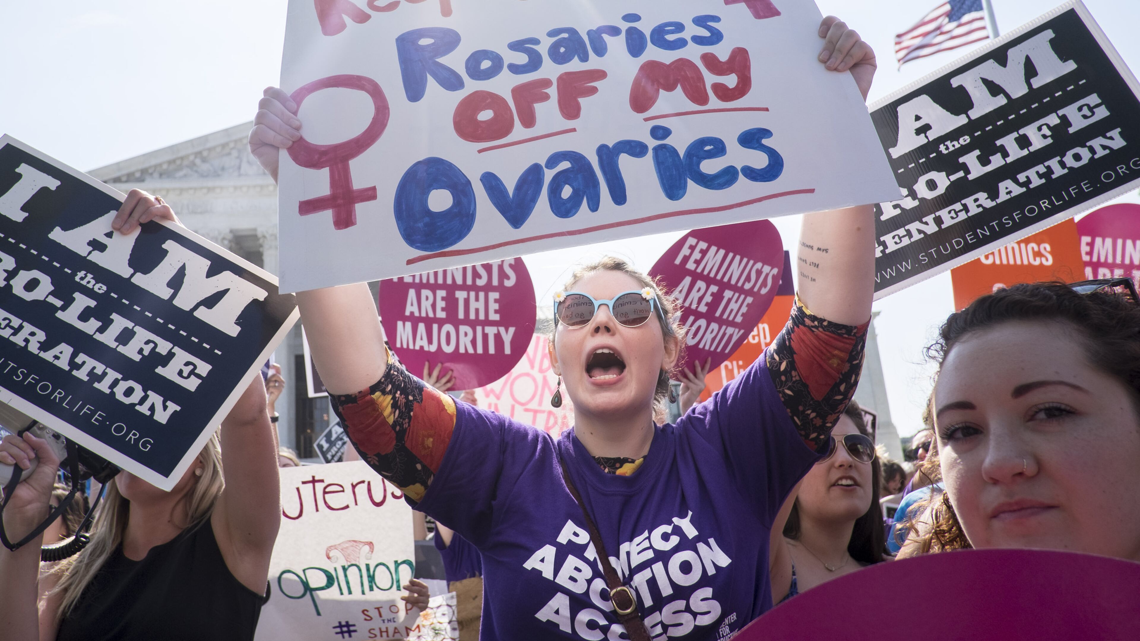 WASHINGTON, DC - JUNE 27: Pro-choice activists celebrate on the steps of the United States Supreme Court on June 27, 2016 in Washington, DC. In a 5-3 decision, the U.S. Supreme Court struck down one of the nation’s toughest restrictions on abortion, a Texas law that women’s groups said would have forced more than three-quarters of the state’s clinics to close. (Photo by Pete Marovich/Getty Images)