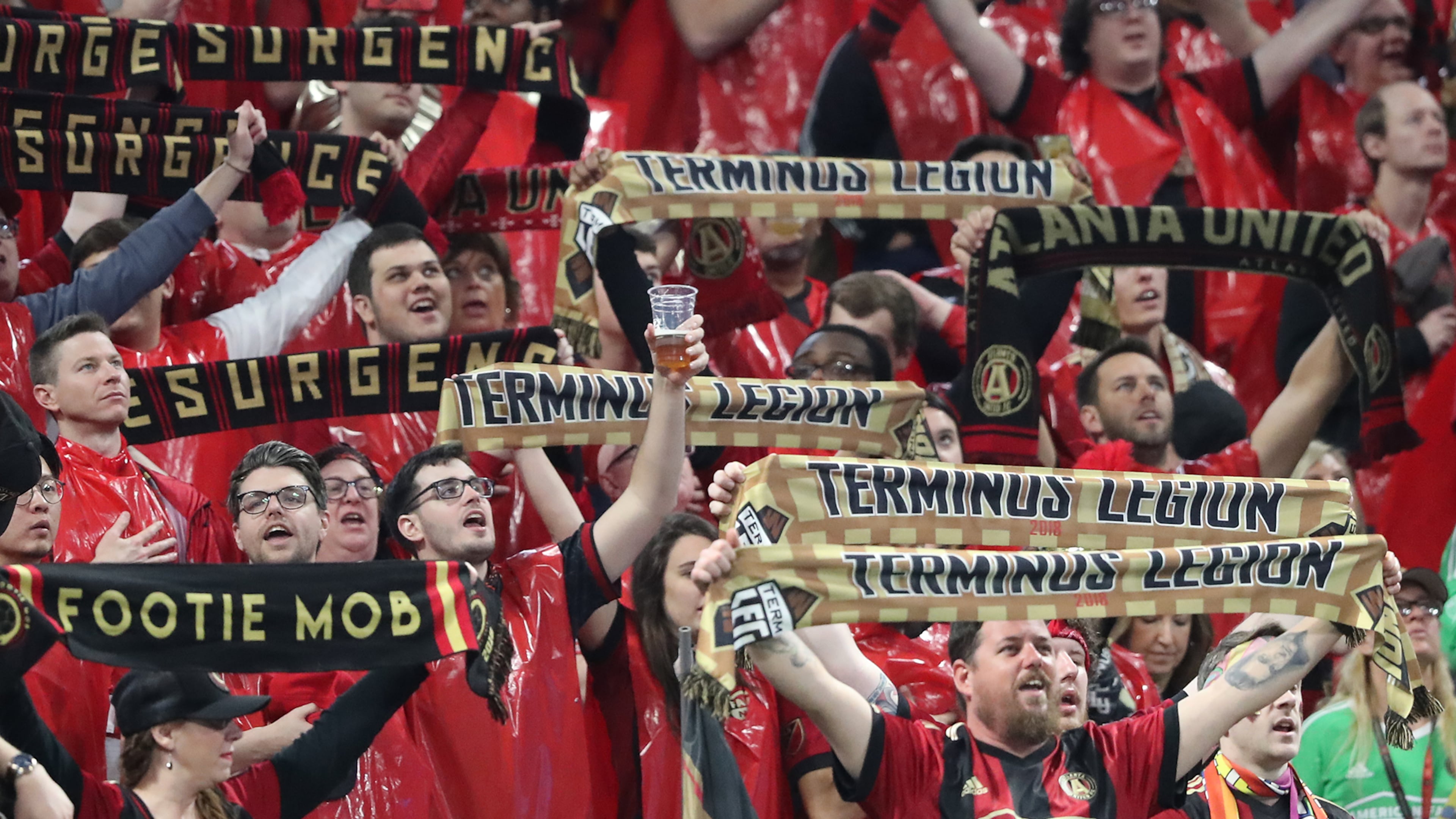March 11, 2018 Atlanta: A Atlanta United fan toasts the team as they take on the D.C. United during their home opener in a MLS soccer game on Sunday, March 11, 2018, in Atlanta. Curtis Compton/ccompton@ajc.com