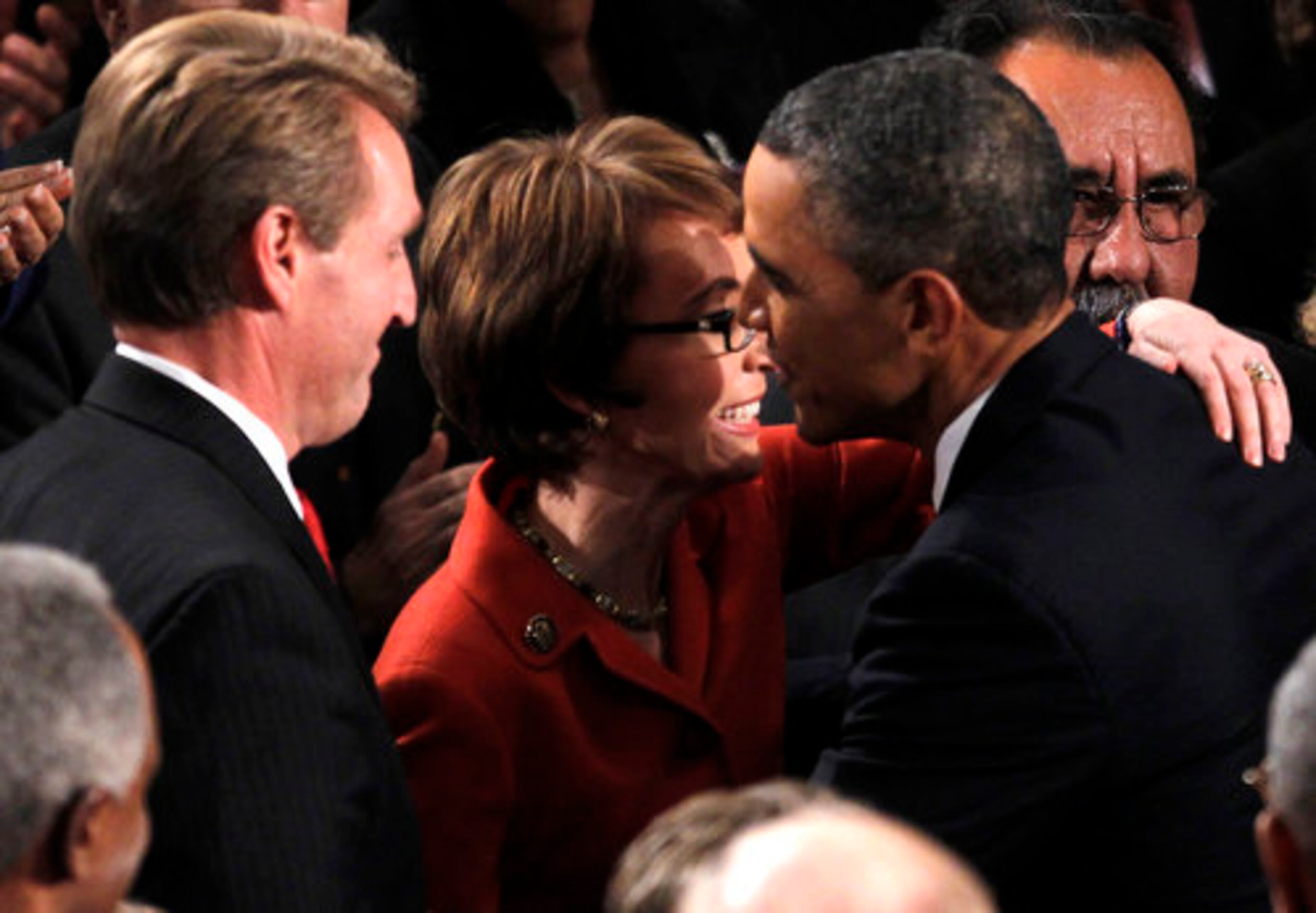 President Barack Obama greets retiring Rep. Gabrielle Giffords, D-Ariz., on Capitol Hill in Washington, Tuesday, Jan. 24, 2012, prior to delivering his State of the Union address.