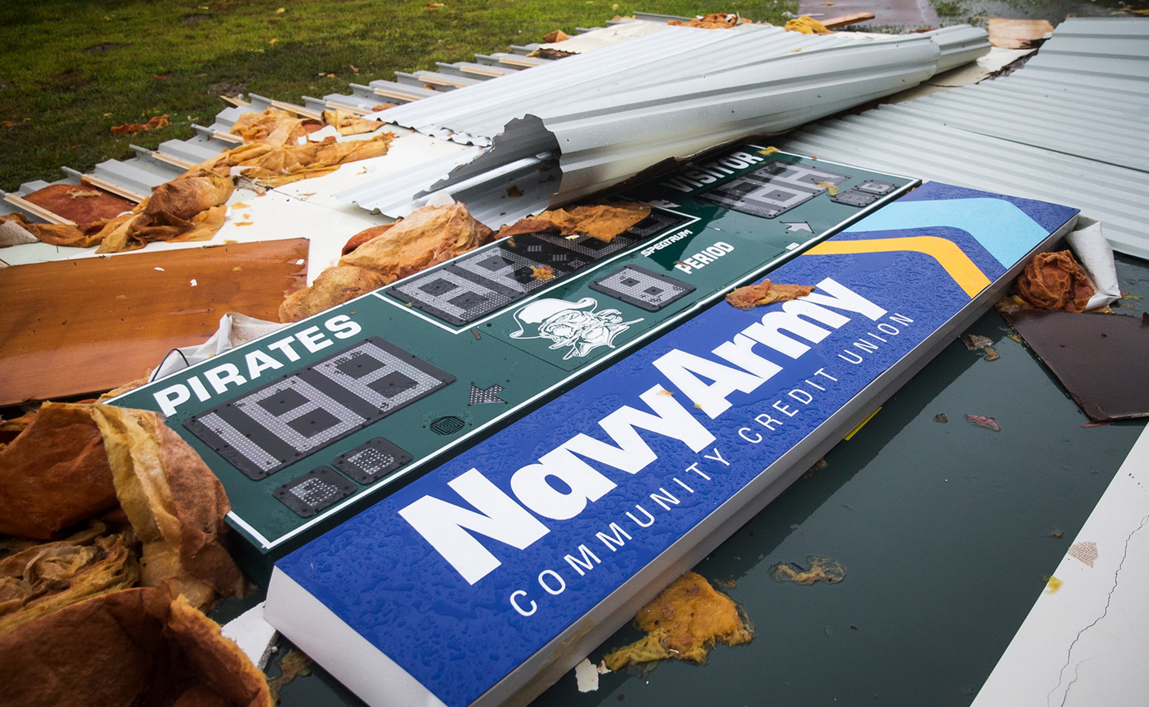 The Rockport-Fulton high school gymnasium scoreboard lays on the ground after Hurricane Harvey ripped through Rockport, Texas, on Saturday, August 26, 2017. The hurricane hit the Texas coast as a category 4 storm, damaging buildings and leaving tens of thousands without power. NICK WAGNER / AMERICAN-STATESMAN