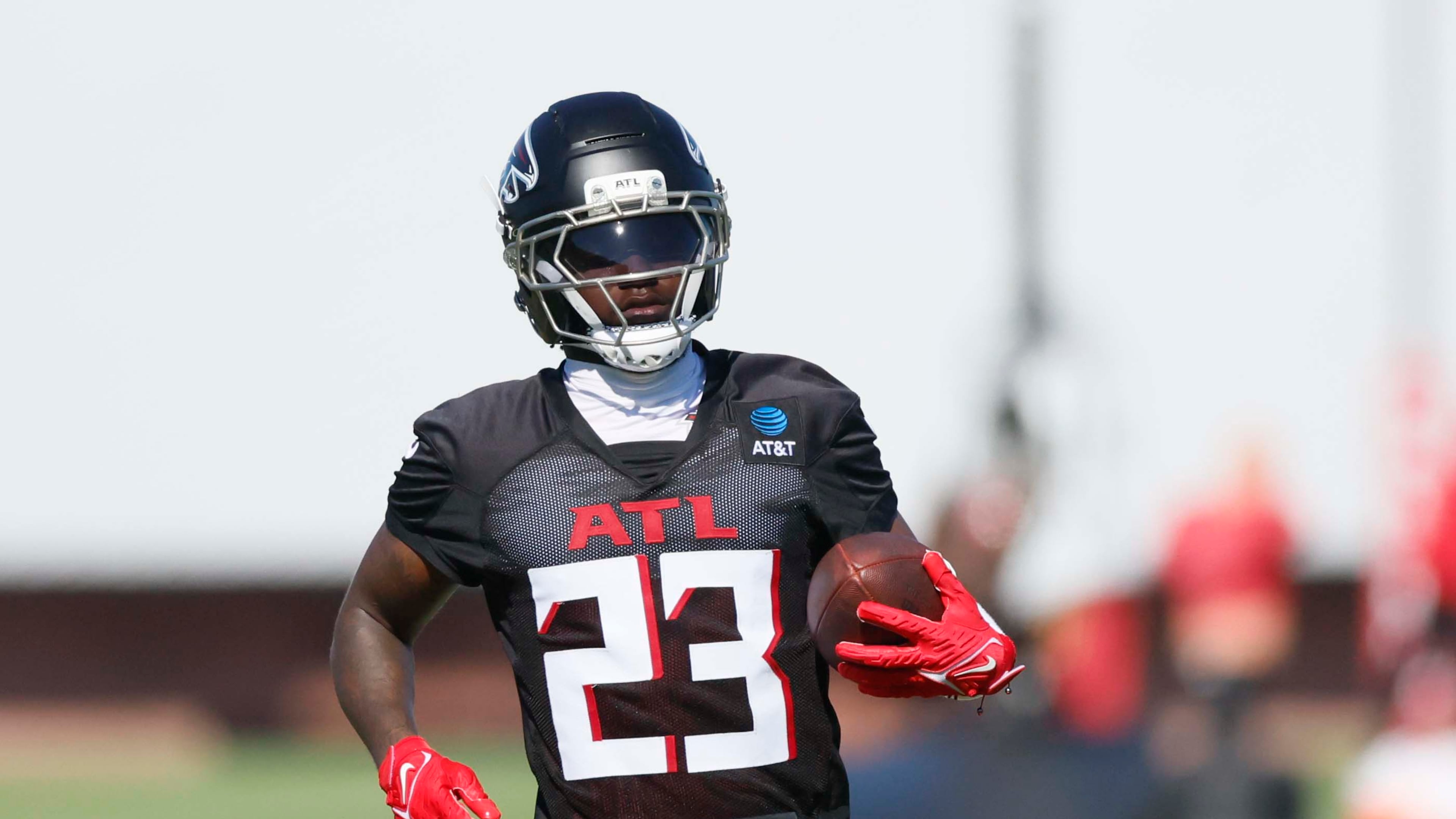 Atlanta Falcons safety DeMarcco Hellams runs with the ball during training camp at the Falcons Practice Facility, on Sunday, July 27, in Flowery Branch, Ga. (Miguel Martinez/AJC)
