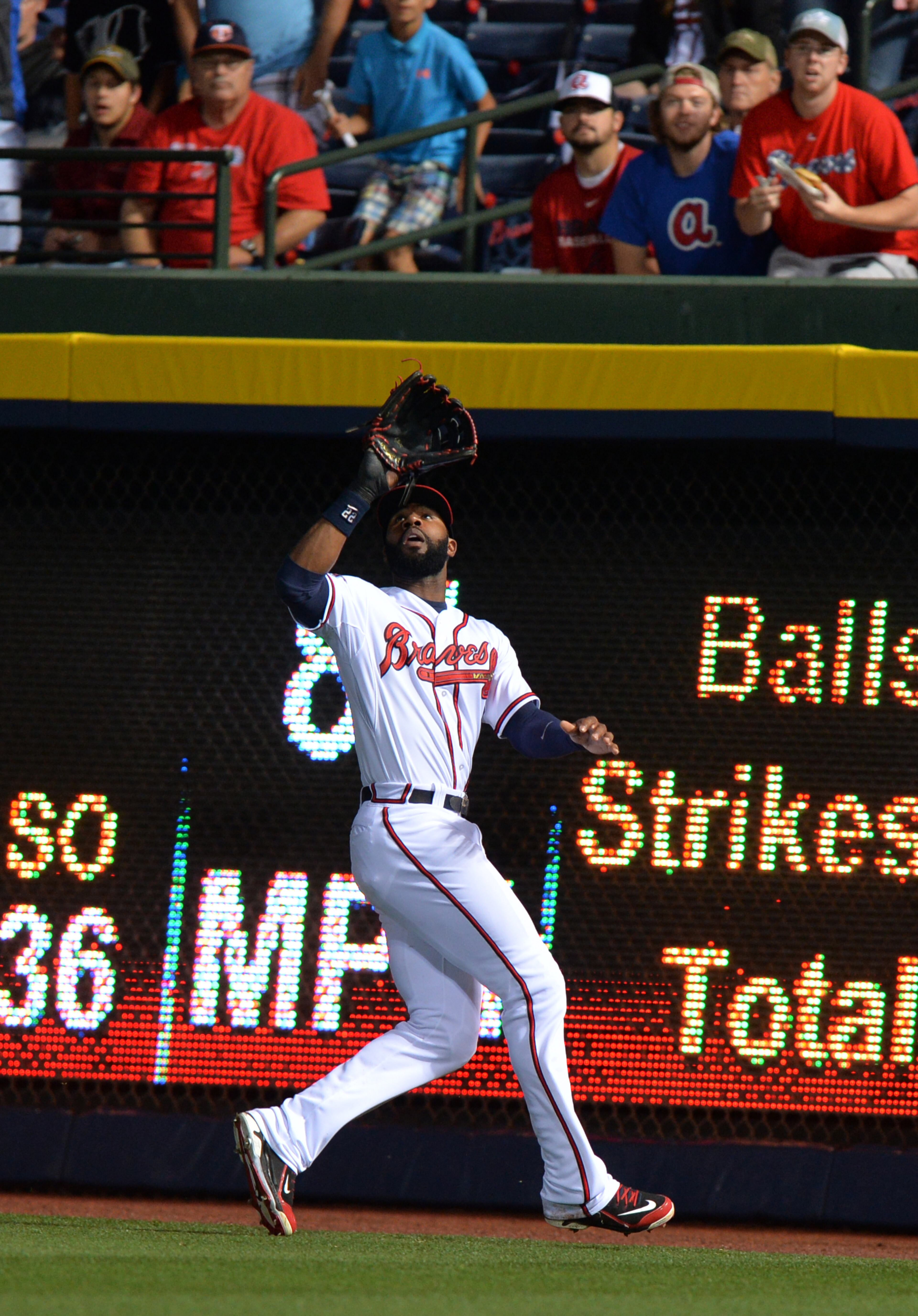 May 9, 2014 Atlanta: Atlanta Braves right fielder Jason Heyward goes to the warning track to make a catch off the bat of Chicago Cubs John Baker in the 3rd inning Friday May 9, 2014 at Turner Field. BRANT SANDERLIN /BSANDERLIN@AJC.COM