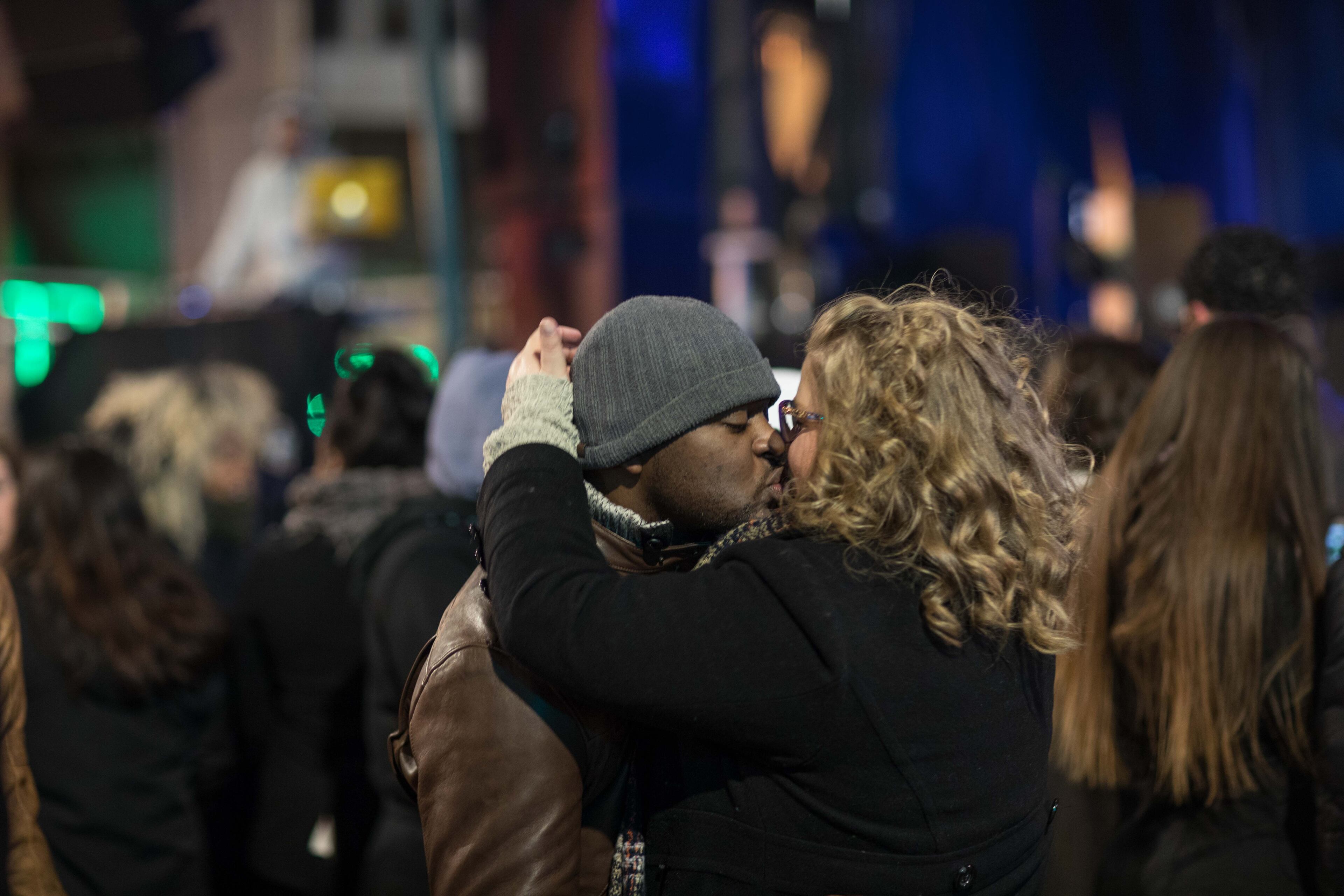 A couple embrace as they dance at Woodruff Park during the Peach Drop 2017, Sunday, Dec. 31, 2017, in Atlanta. BRANDEN CAMP/SPECIAL