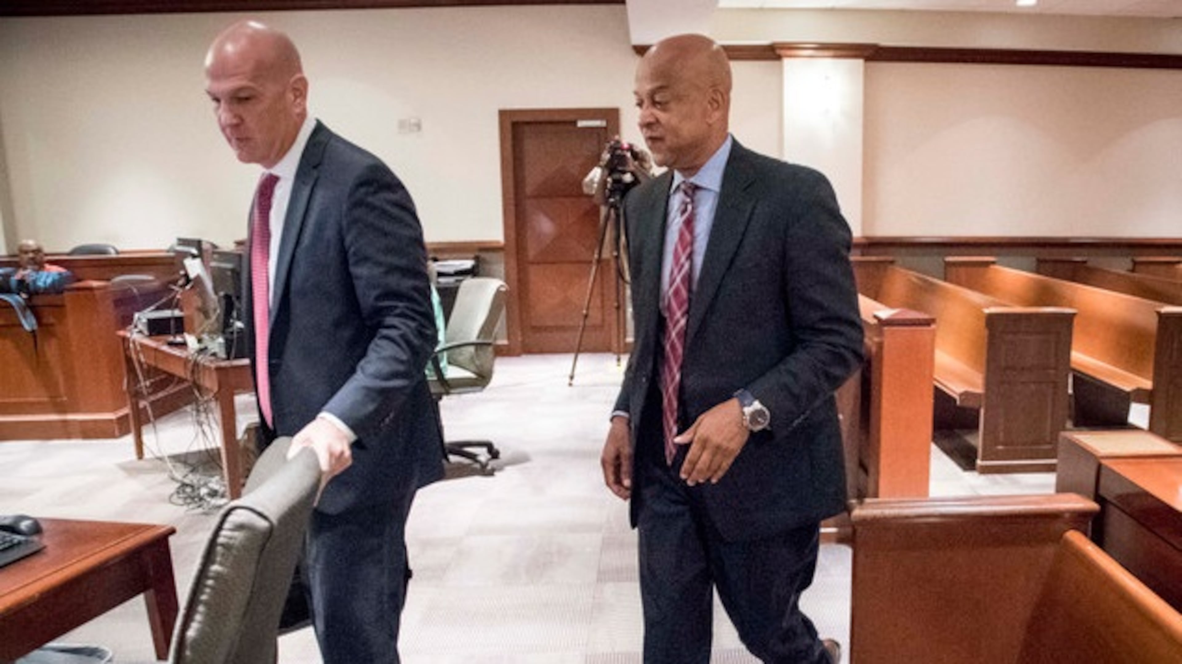 DeKalb County Sheriff Jeff Mann, right, with his attorney, Noah Pines, pleaded not guilty to charges of indecency and obstruction in Atlanta Municipal Court on Friday, June 2. JOHN AMIS / AJC