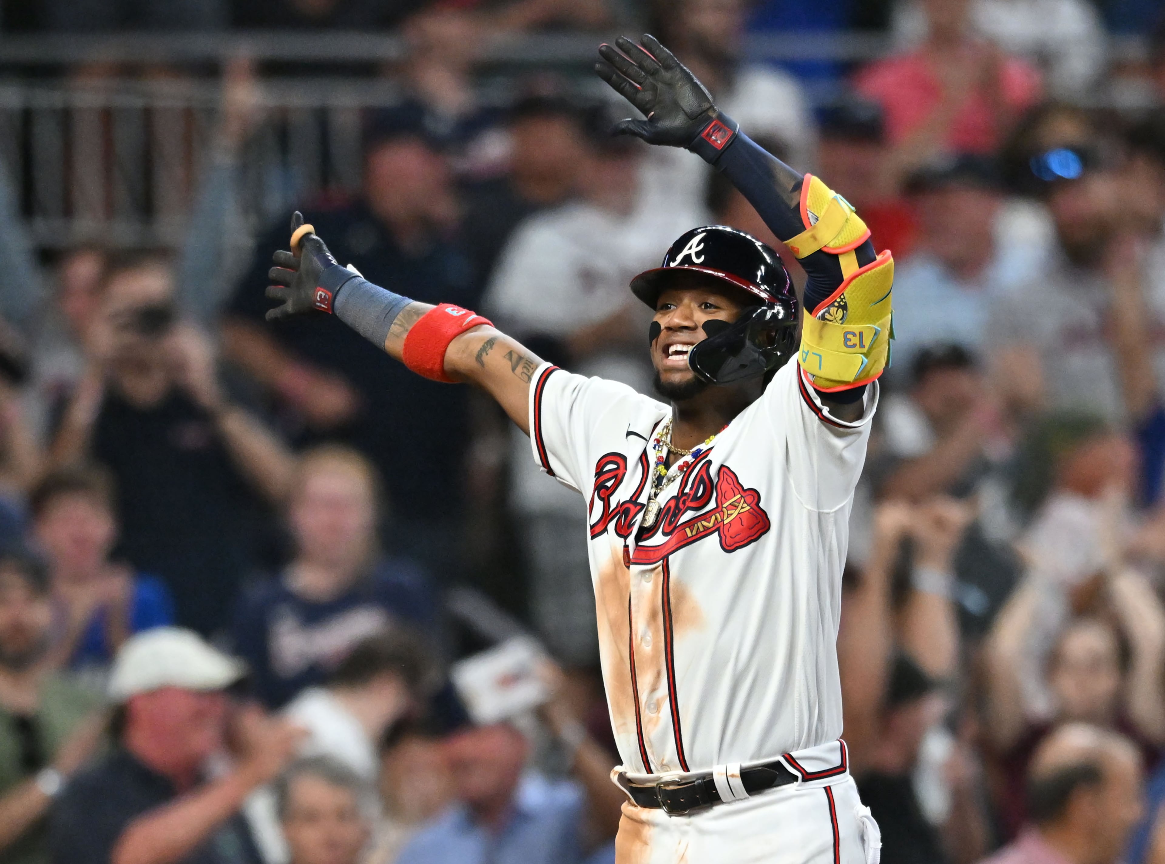 Atlanta Braves' right fielder Ronald Acuna Jr. (13) celebrates after hitting a solo home run during the sixth inning at Truist Park, Tuesday, September 19, 2023, in Atlanta. Atlanta Braves won 9-3 over Philadelphia Phillies. (Hyosub Shin / Hyosub.Shin@ajc.com)