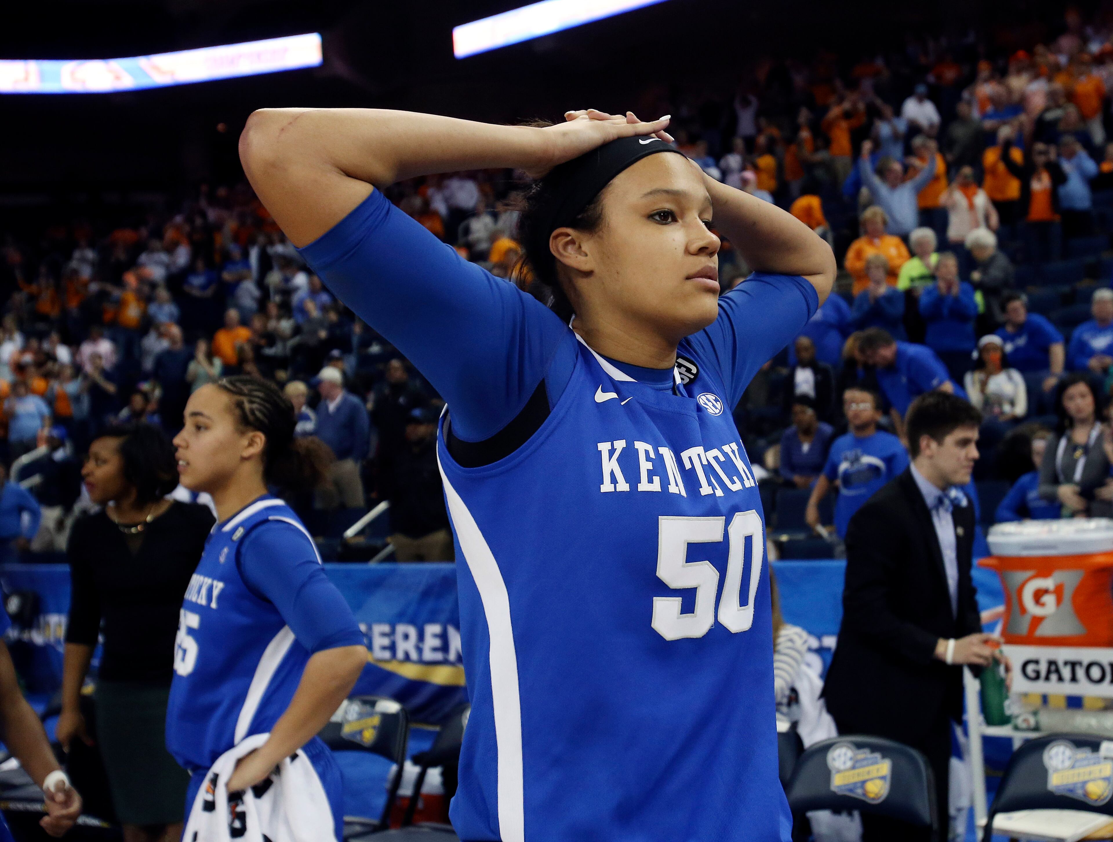 Kentucky's Azia Bishop (50) reacts after their loss to Tennessee in an NCAA college basketball game in the finals of the Southeastern Conference women's basketball tournament Sunday, March 9, 2014, in Duluth, Ga. Tennessee won 71-70. (AP Photo/Jason Getz)