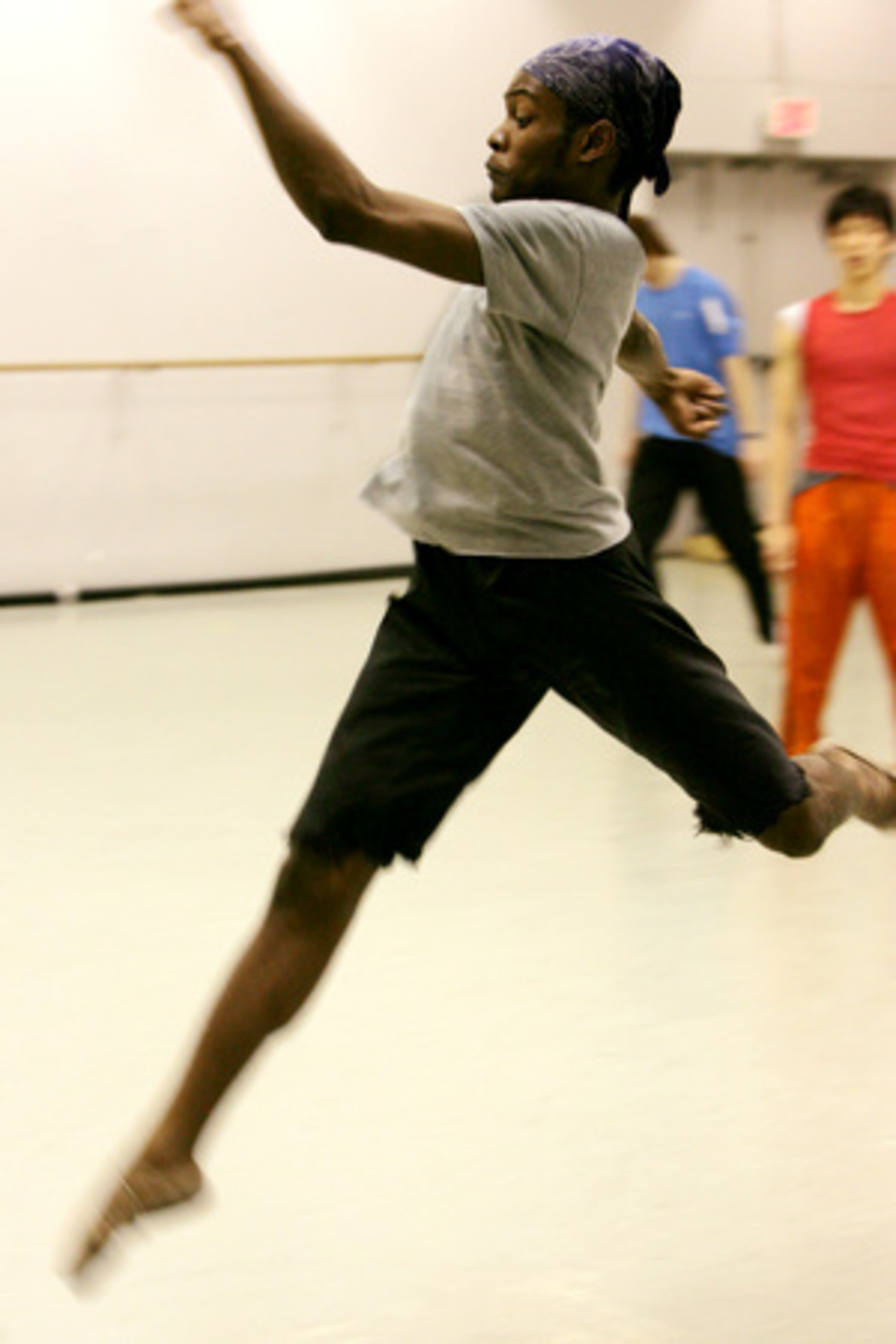 JARROD KANTRELL leaps during the "big" rehearsal.
