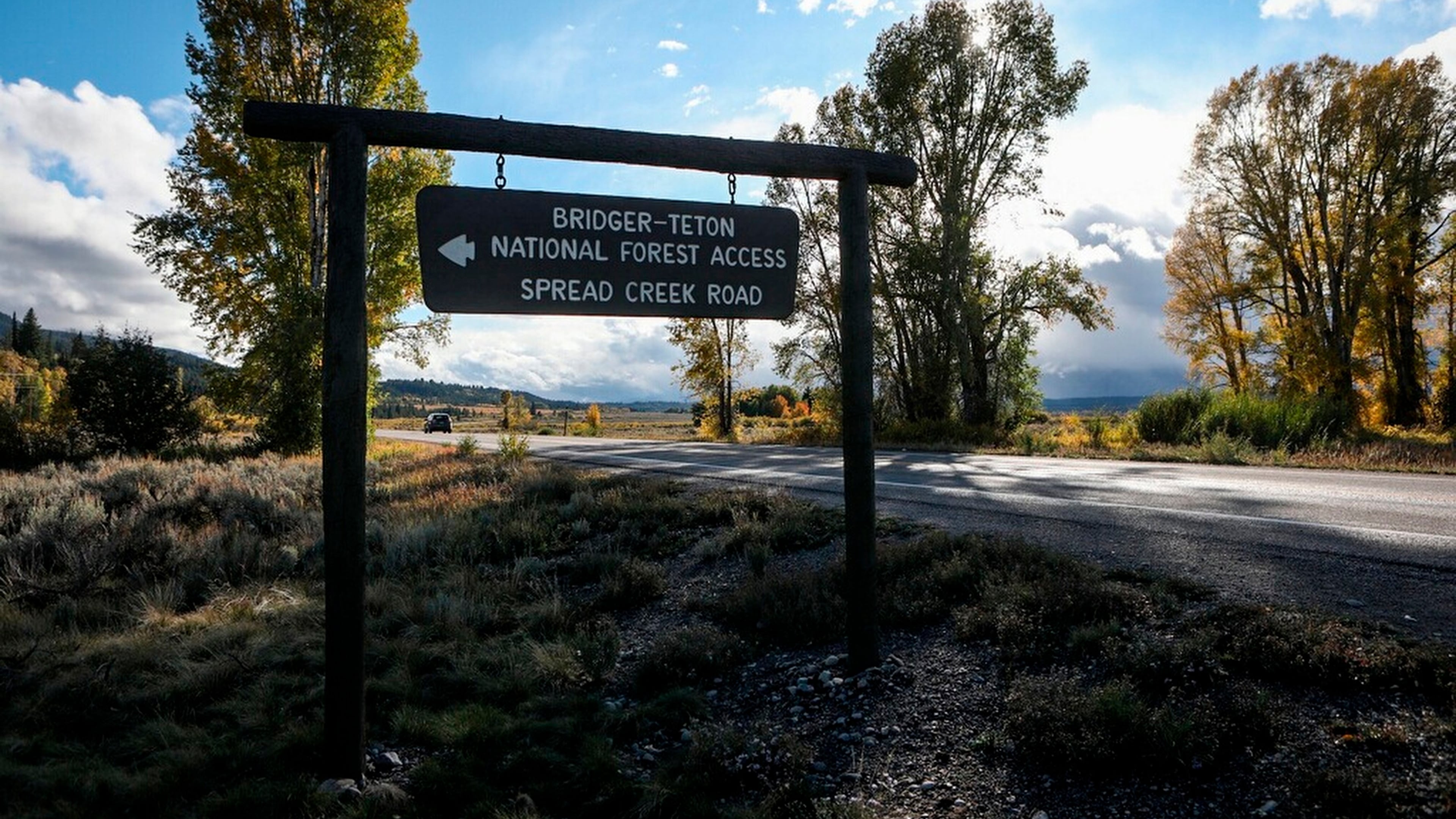 FILE - A sign gives directions to the Bridger-Teton National Forest on Sept. 19, 2021 in Wyoming. (AP Photo/Amber Baesler, File)