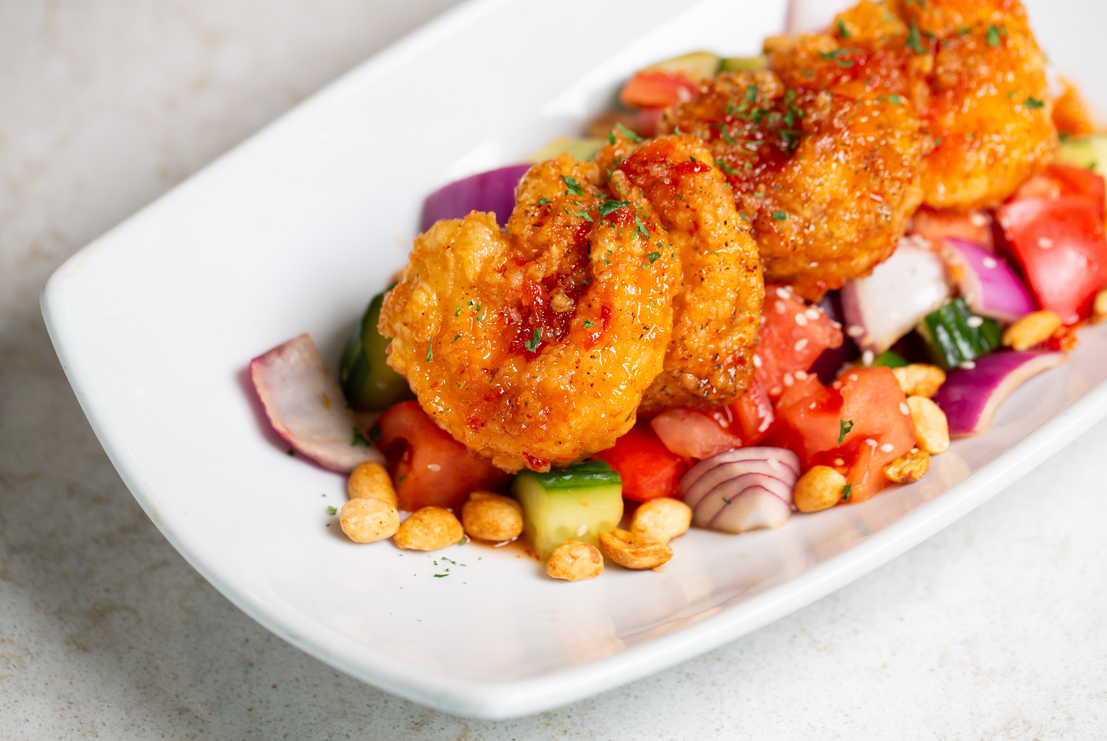 Red chile-glazed shrimp is on the menu at Dahlia's Restaurant and Porch in Peachtree Corners. / Courtesy of Dahlia's Restaurant & Porch