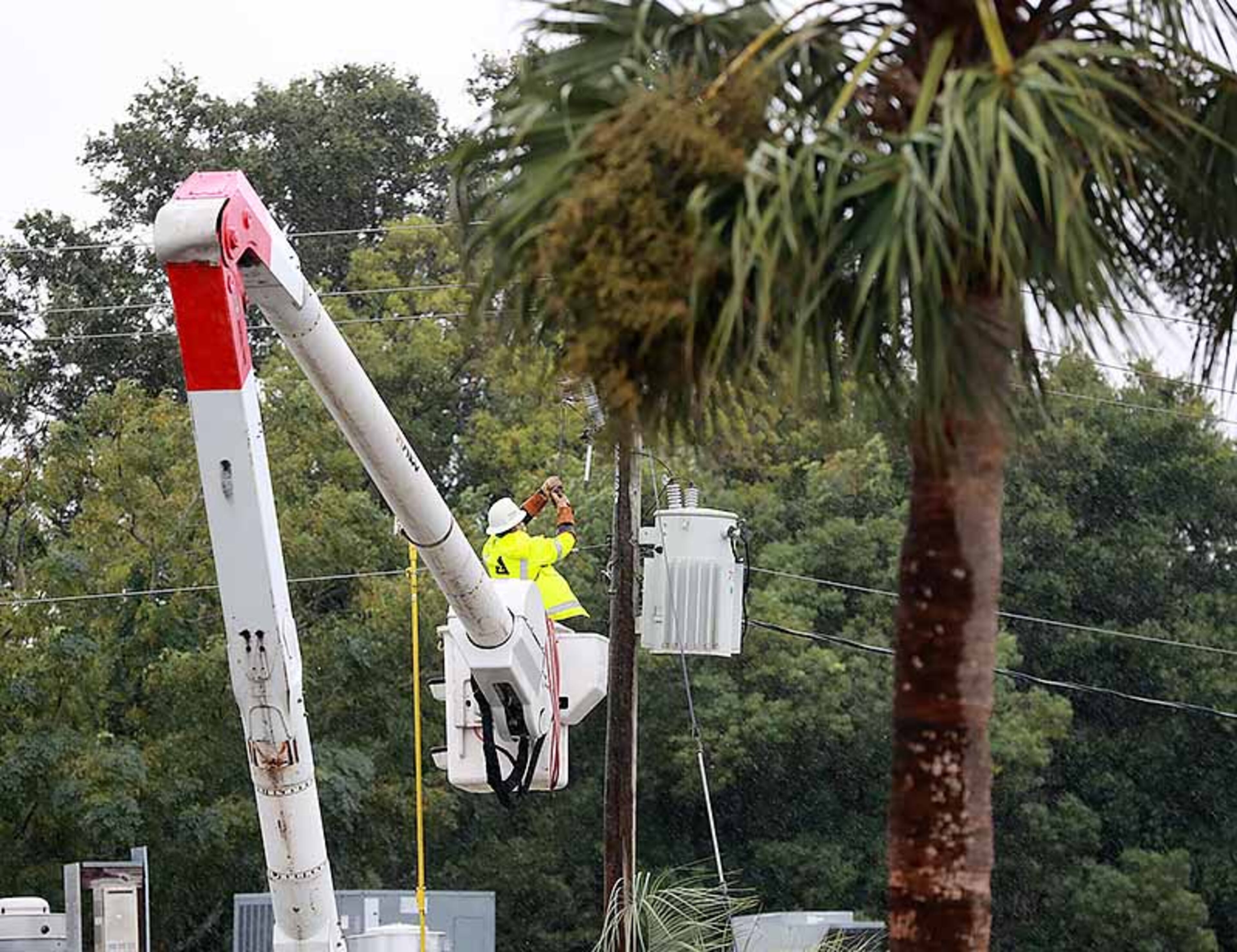 September 4, 2019 St. Mary's: A Georgia Power worker restores a line during Hurricane Dorian on Wednesday, Sept. 4, 2019, at St. Mary's. Curtis Compton/ccompton@ajc.com