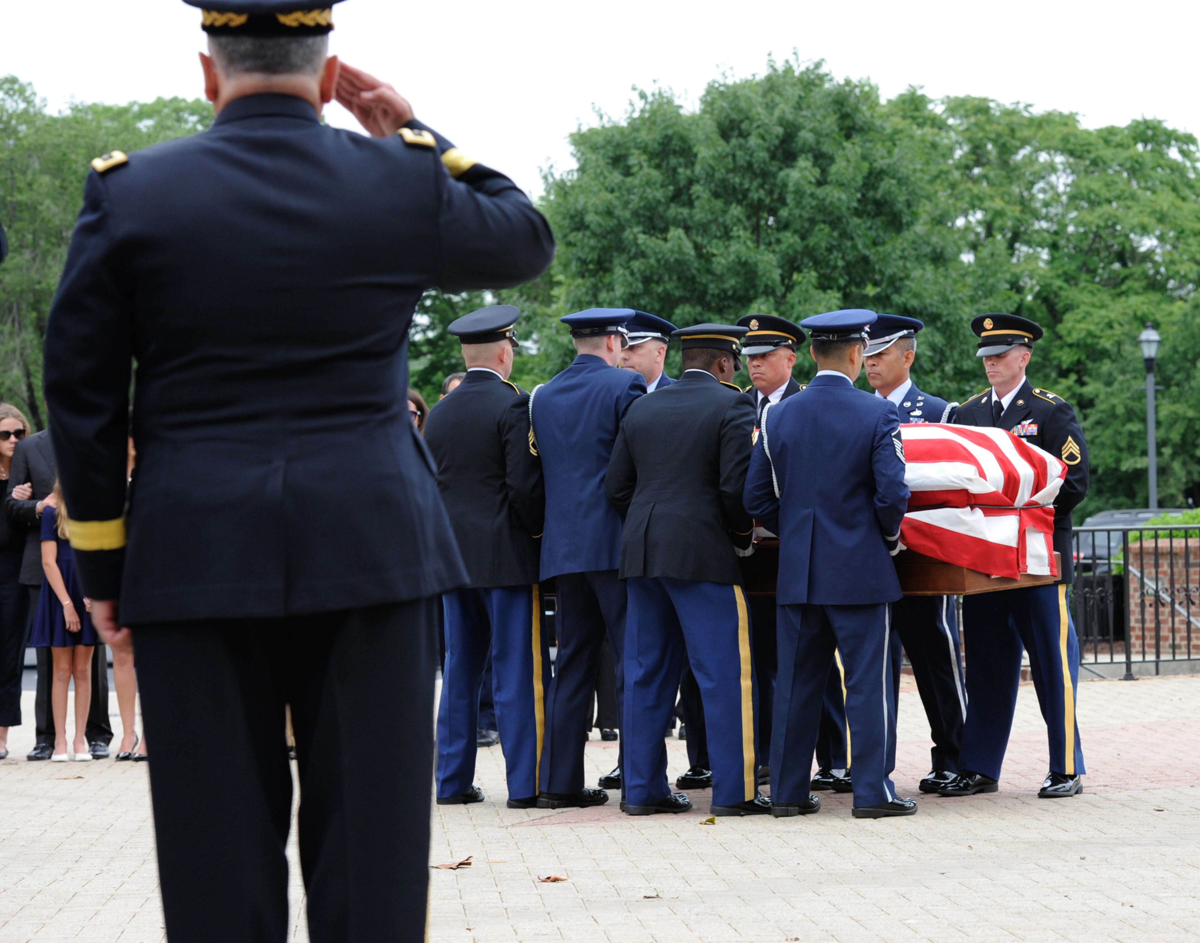 The body of former Delaware Attorney General Beau Biden arrives at Legislative Hall before a viewing in Dover, Del. Biden, the vice president's eldest son, died of brain cancer Saturday at age 46. (Jason Minto/The Wilmington News-Journal via AP)