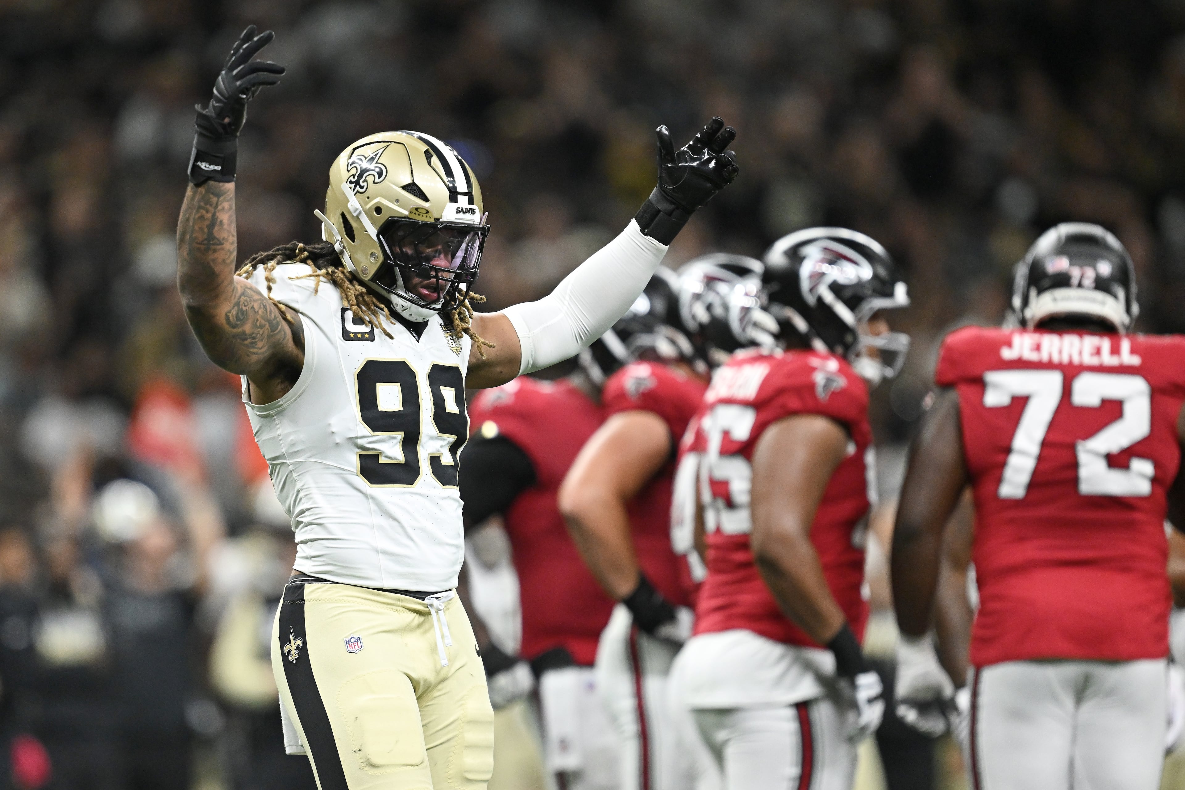 New Orleans Saints defensive end Chase Young (left) gestures during the first half of an NFL football game against the Atlanta Falcons in New Orleans, Monday, Oct. 5, 2026. (Ella Hall/AP)